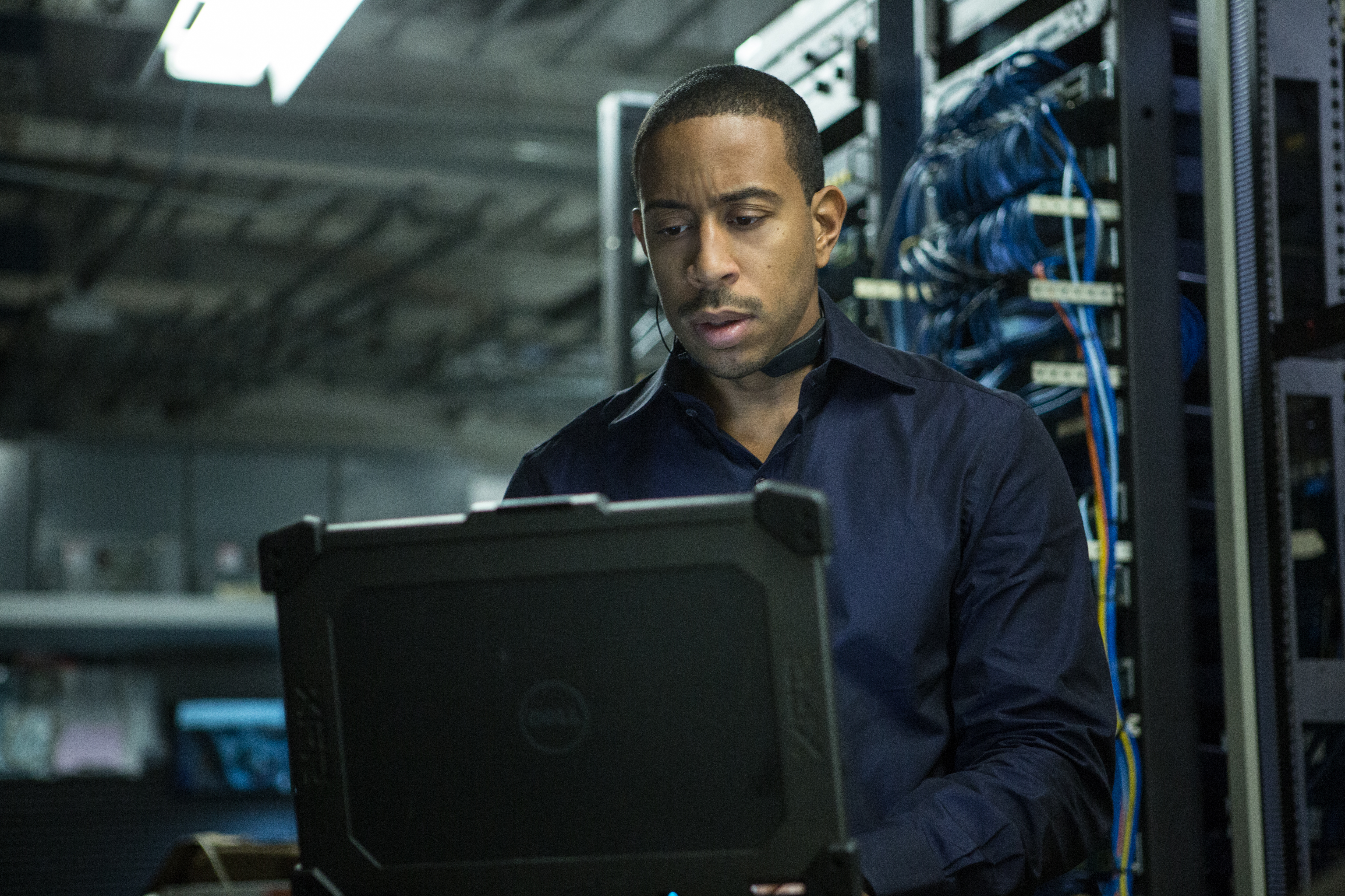 Ludacris in a server room with a laptop HD Wallpaper