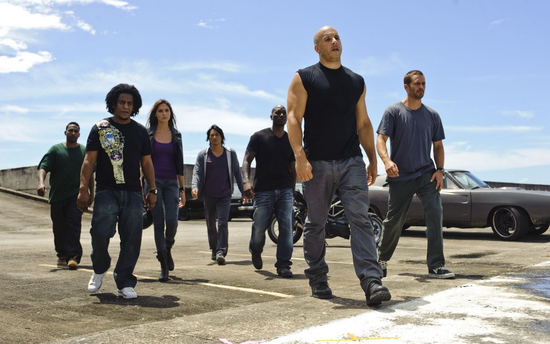 Fast & Furious cast walking on a rooftop HD Wallpaper