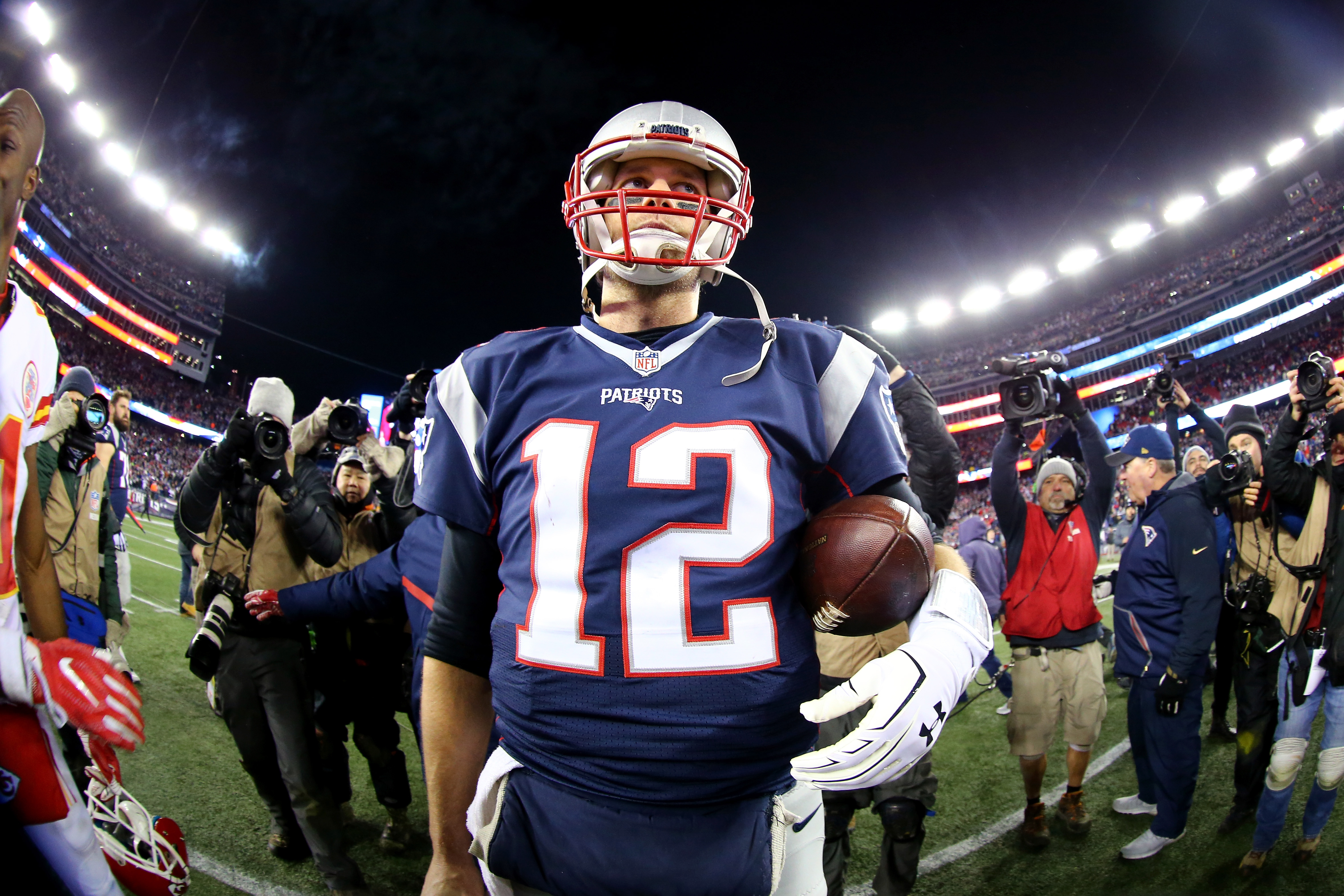 Tom Brady from New England Patriots holding football HD Wallpaper