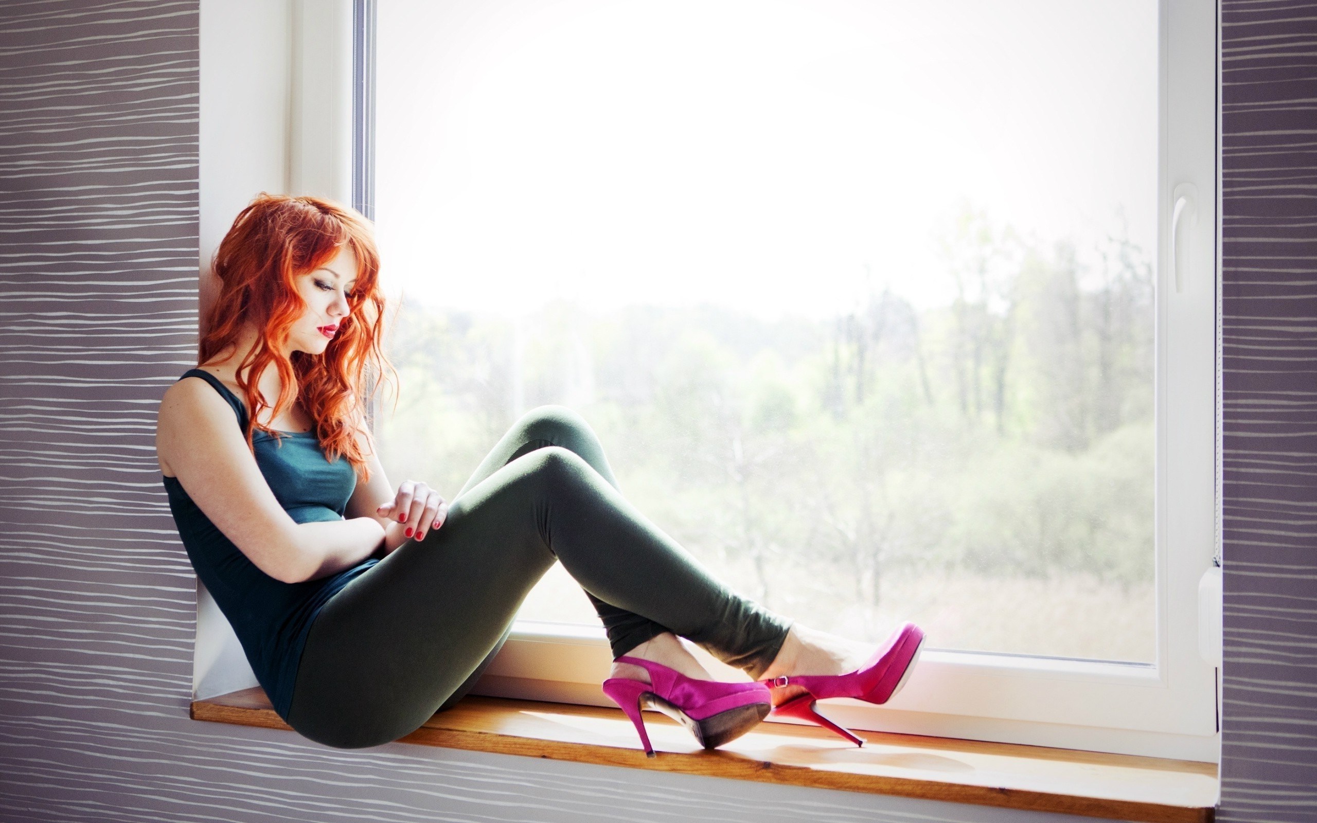 Woman with red hair sitting on a windowsill HD Wallpaper