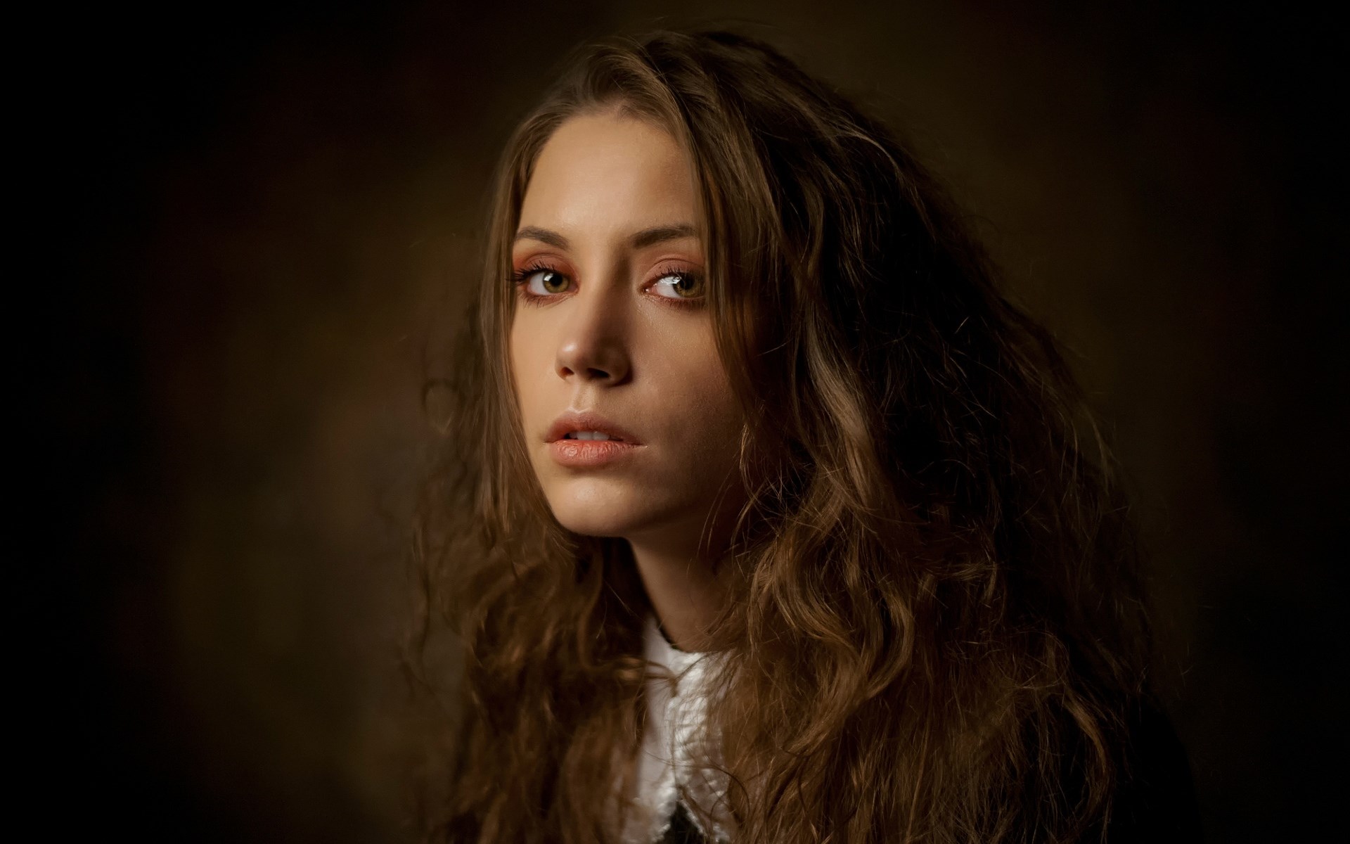 Woman with curly brown hair and white collar HD Wallpaper