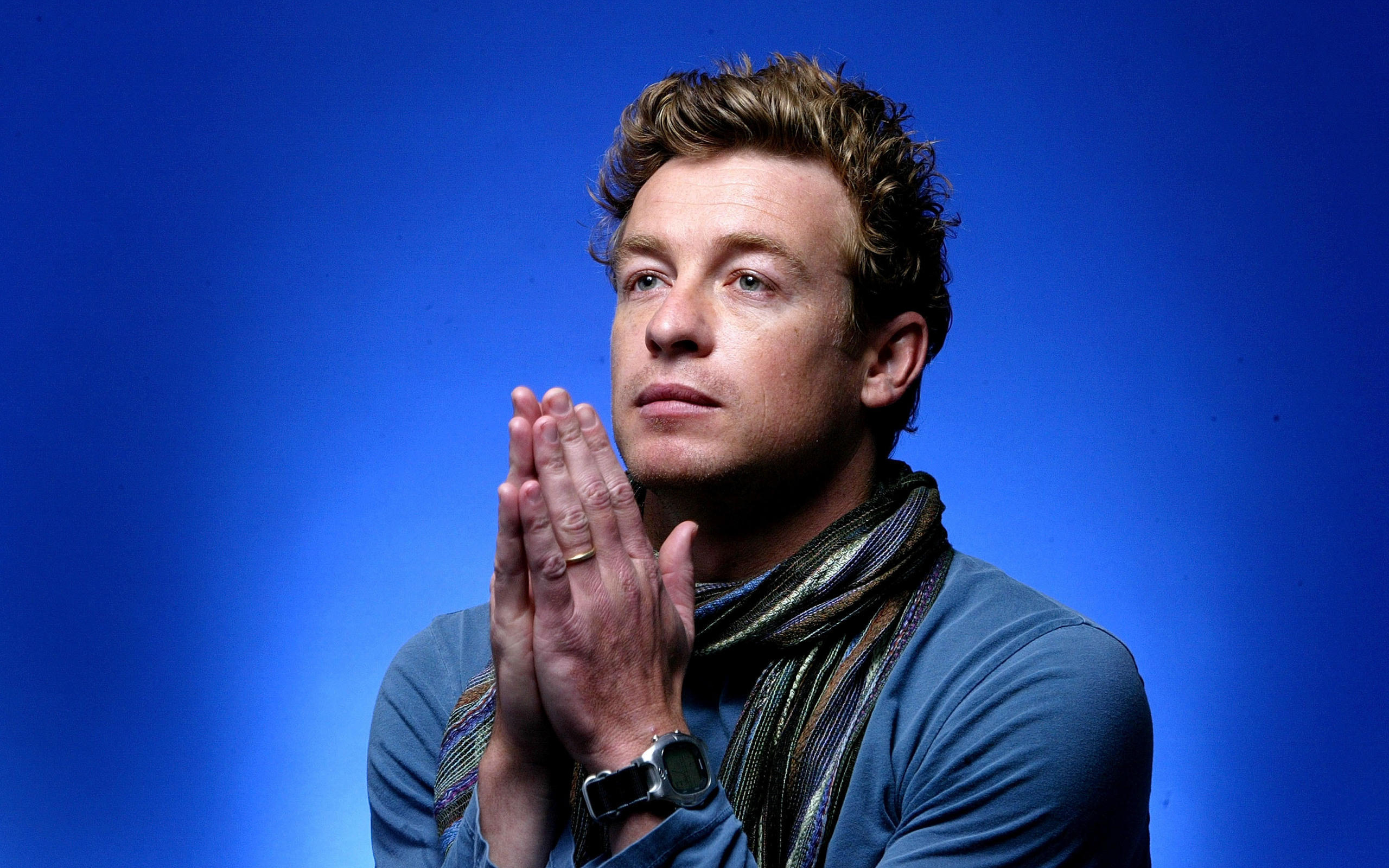 Simon Baker with hands clasped HD Wallpaper