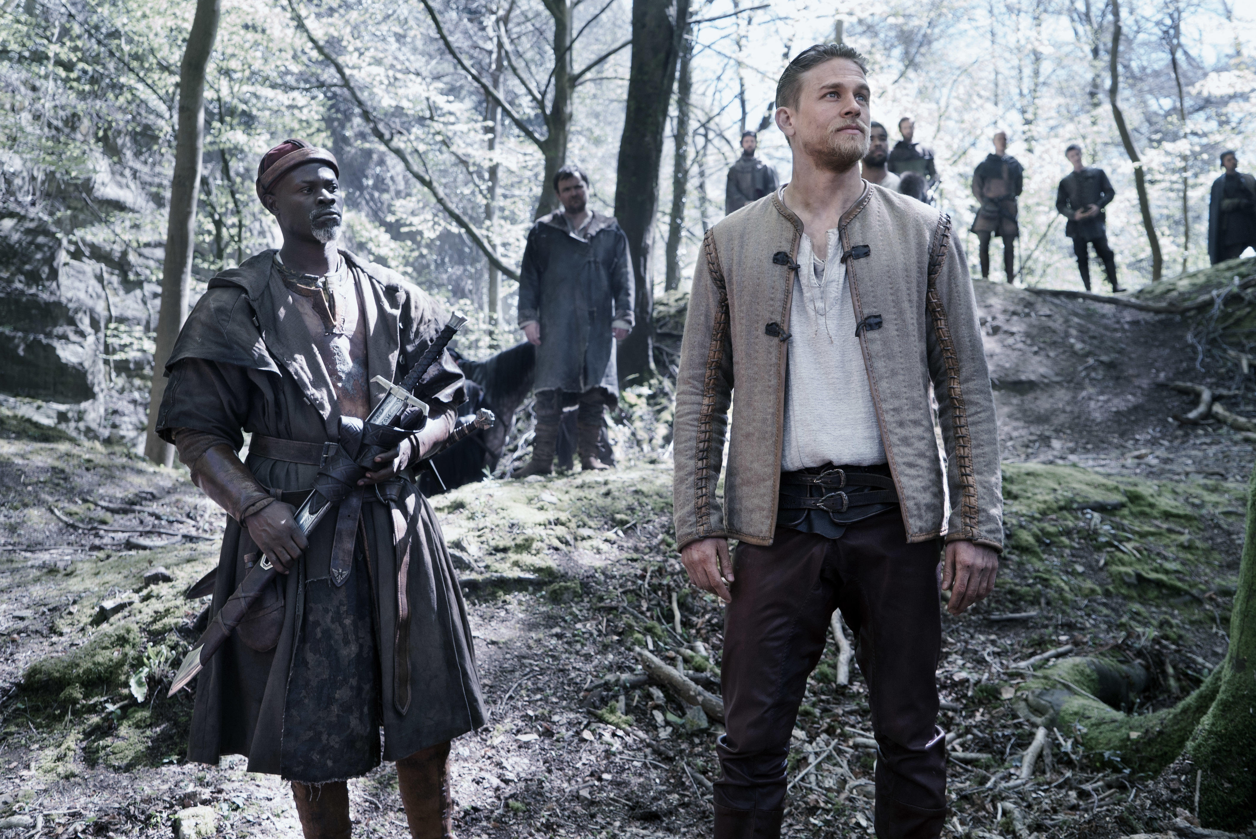 Charlie Hunnam and man in forest HD Wallpaper