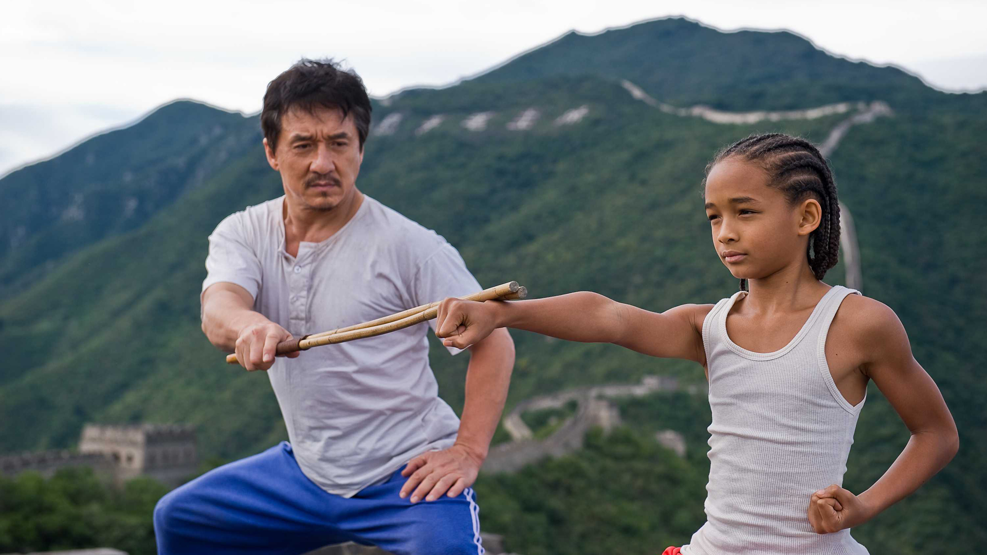 Jackie Chan and Jaden Smith training with sticks HD Wallpaper