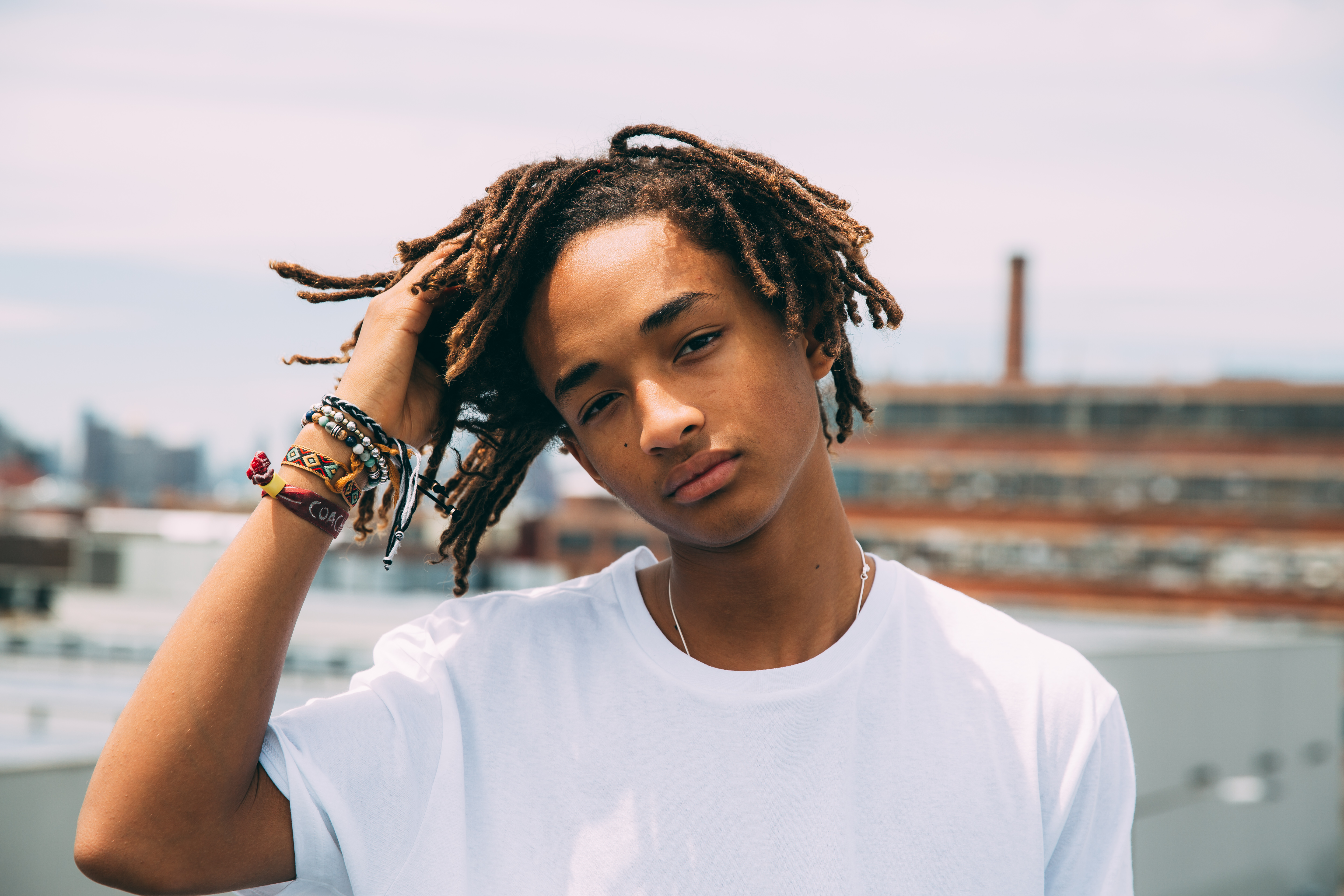 Jaden Smith with dreadlocks and bracelets HD Wallpaper