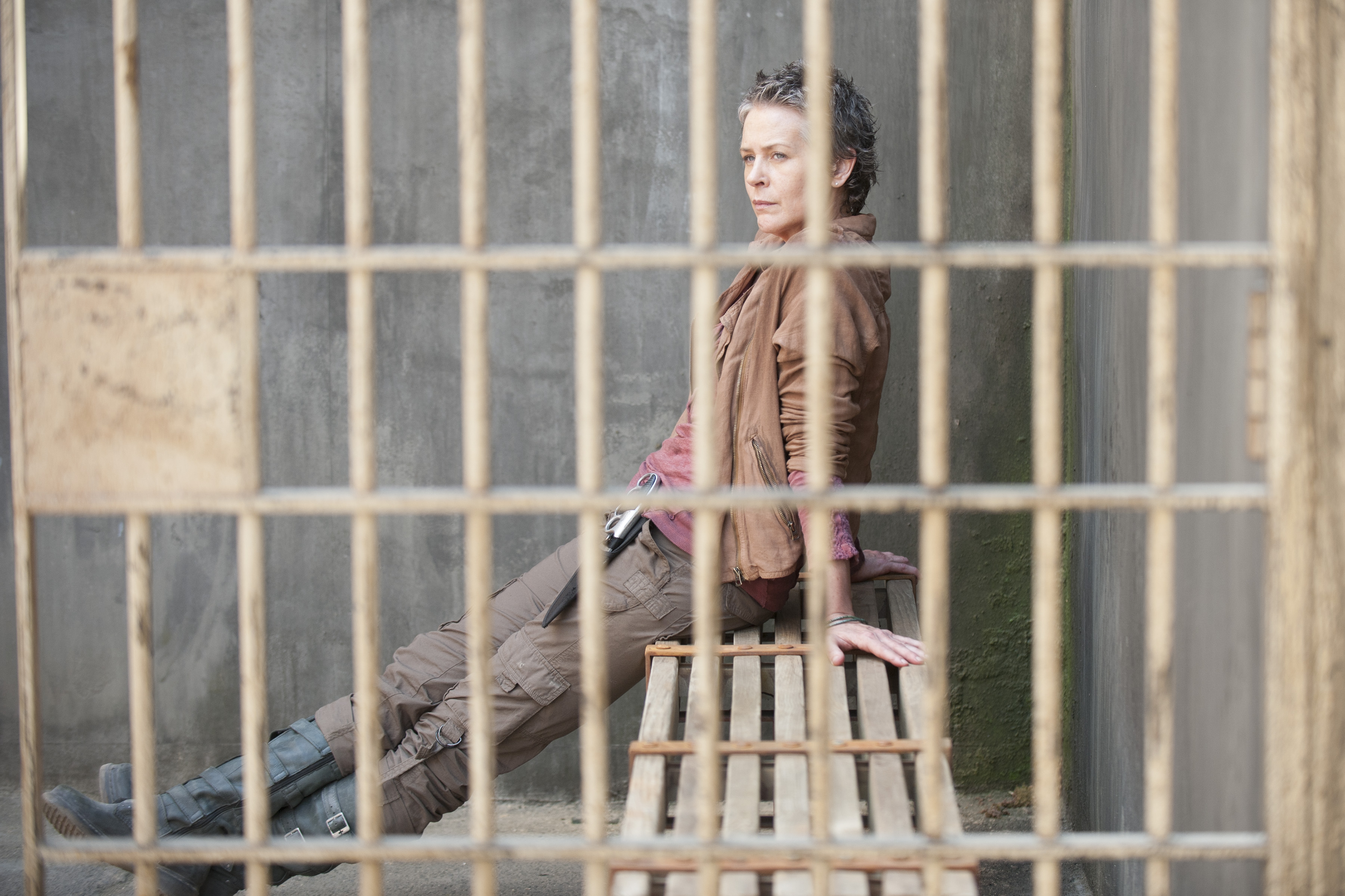 Melissa McBride in a prison cell HD Wallpaper