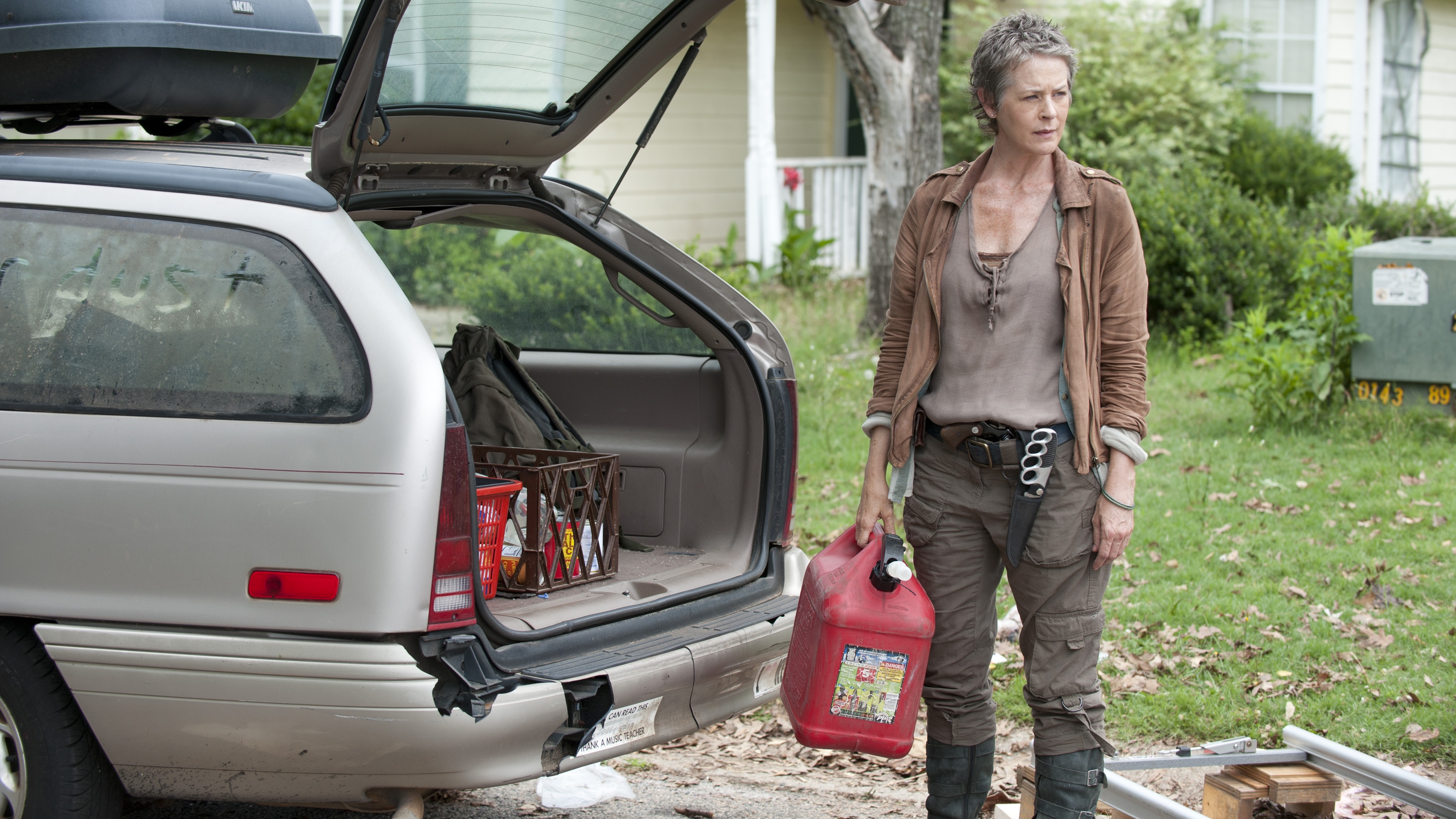 Carol from The Walking Dead with gas can HD Wallpaper