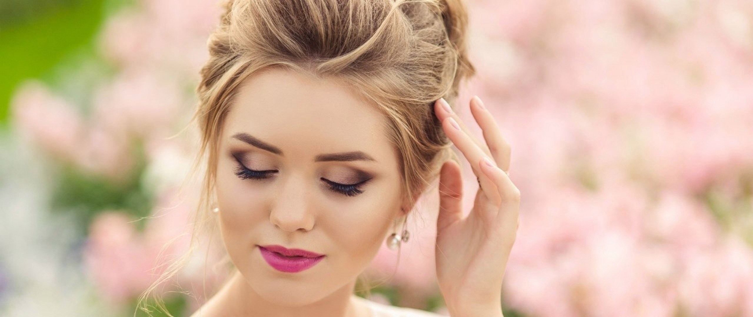 Woman with elegant makeup and hairstyle outdoors HD Wallpaper