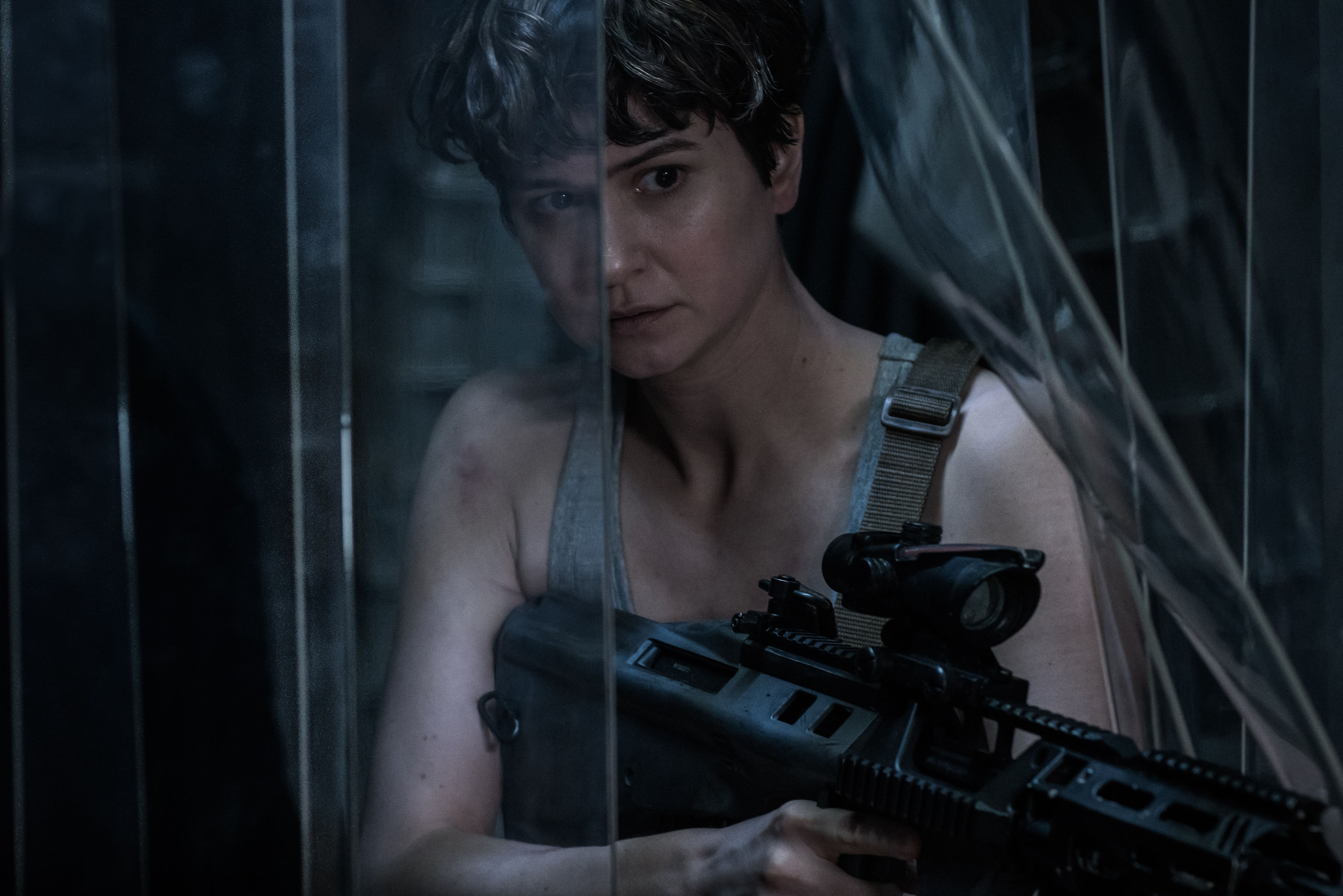 Katherine Waterston holding a rifle HD Wallpaper