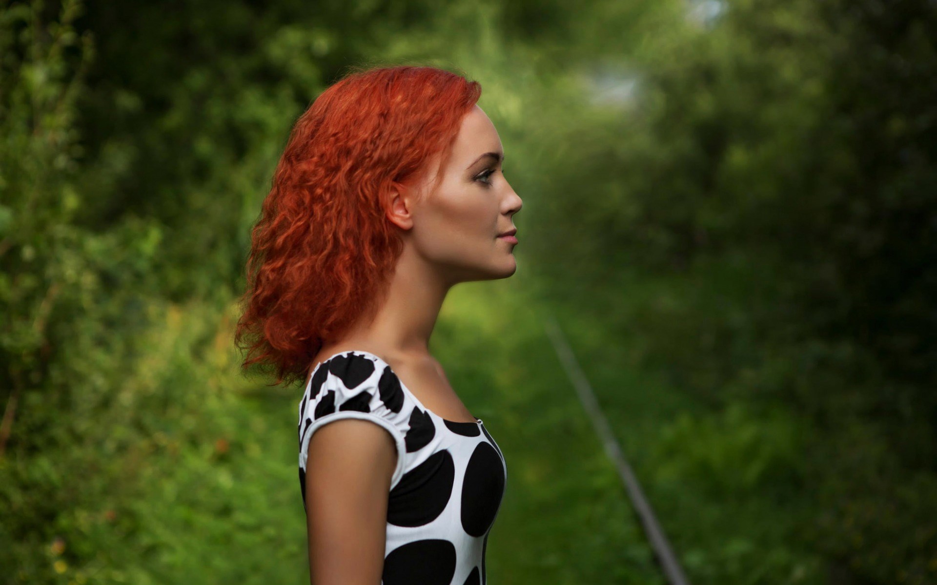 Woman with red curly hair in a polka dot dress HD Wallpaper