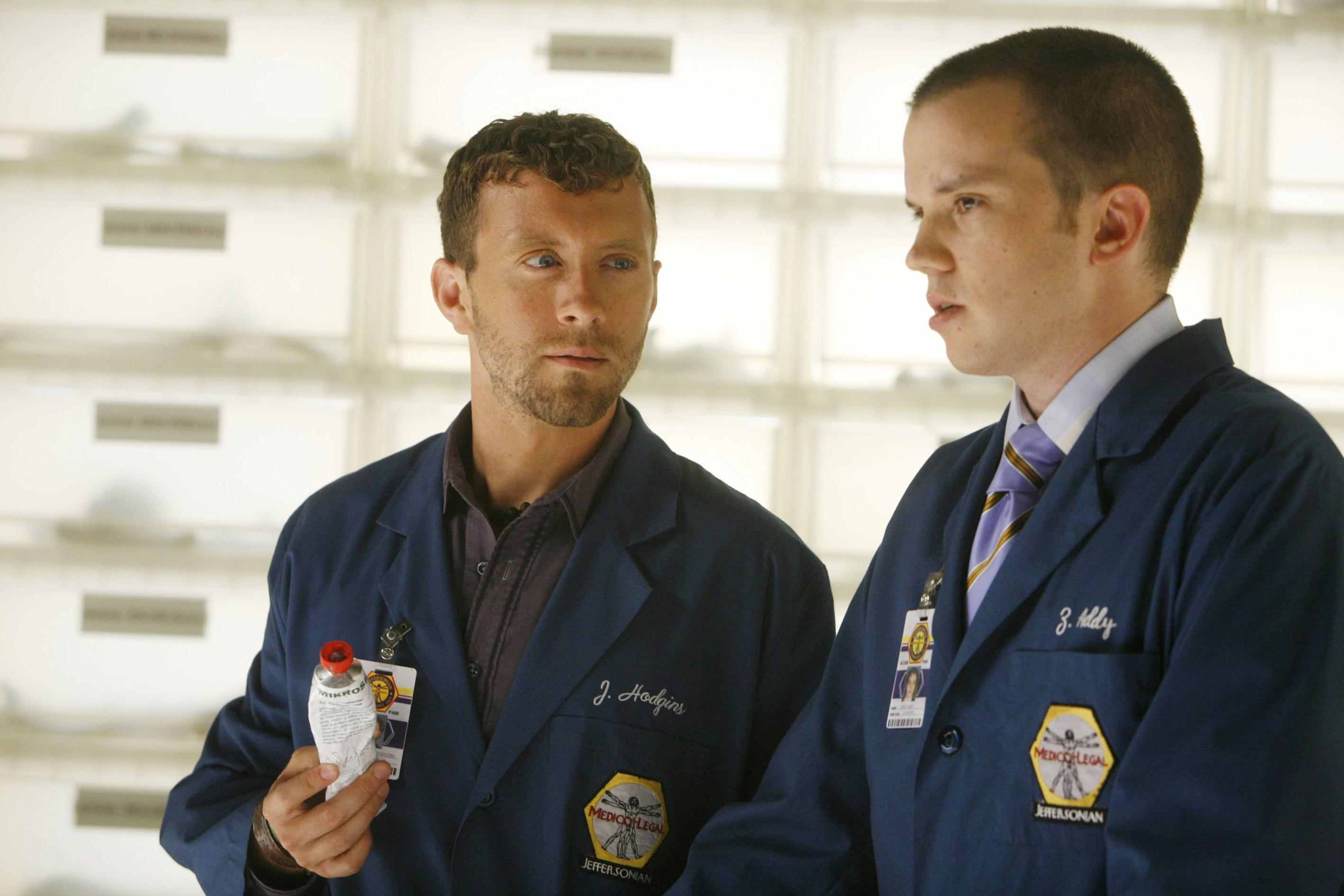 Two men in lab coats in a lab HD Wallpaper
