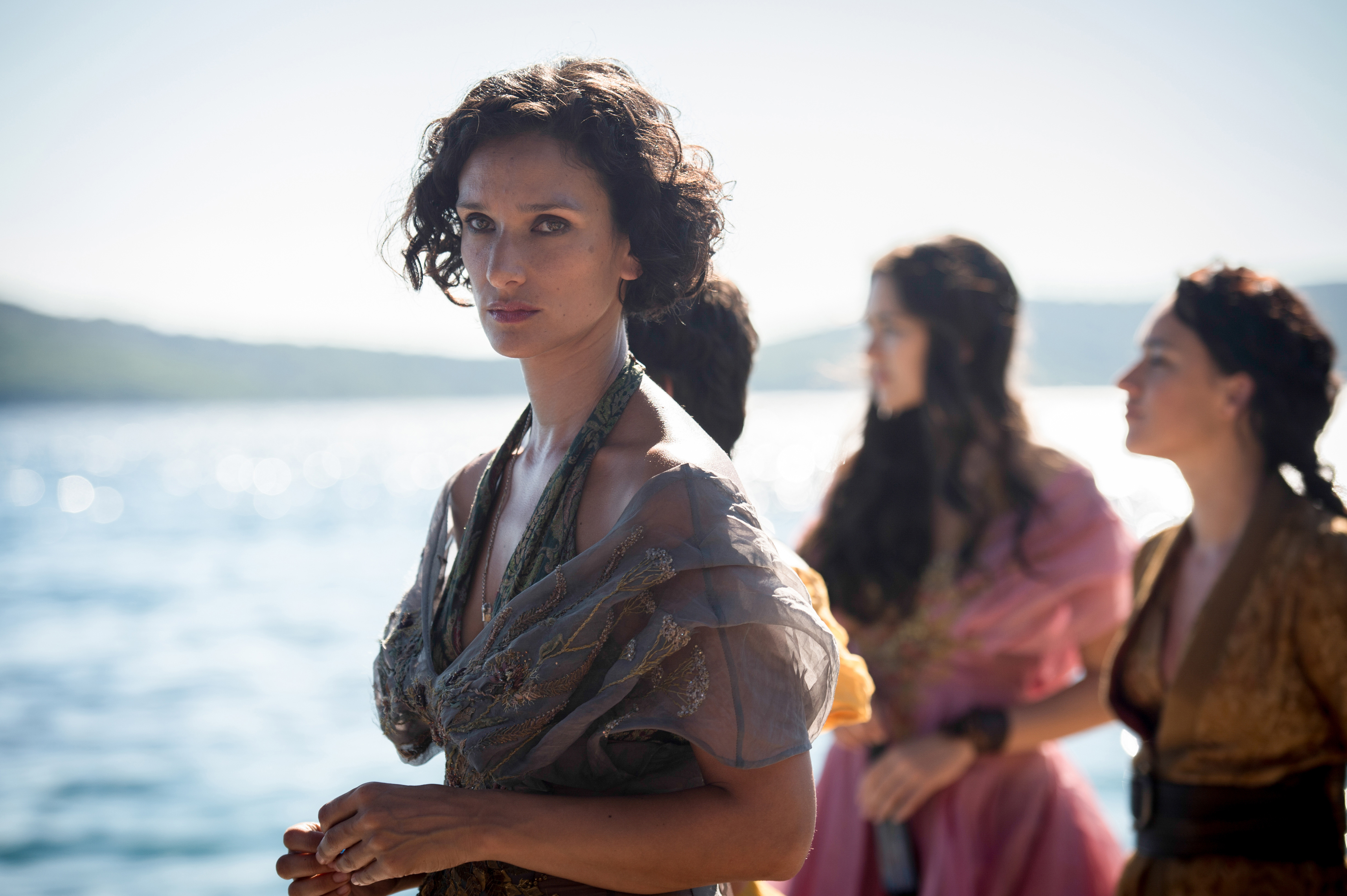 Indira Varma on a sunny day by the water HD Wallpaper