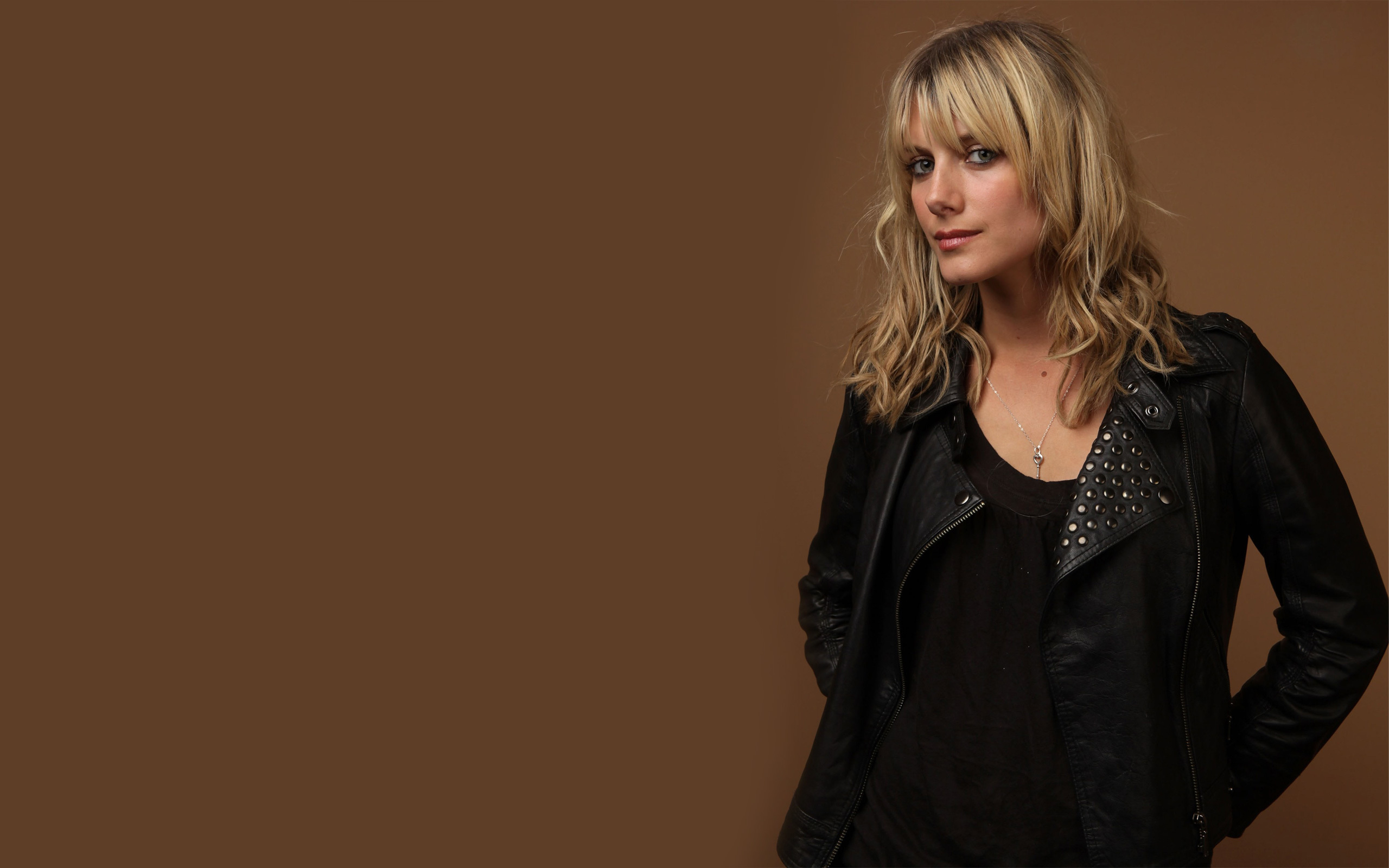 Mélanie Laurent in a black leather jacket HD Wallpaper
