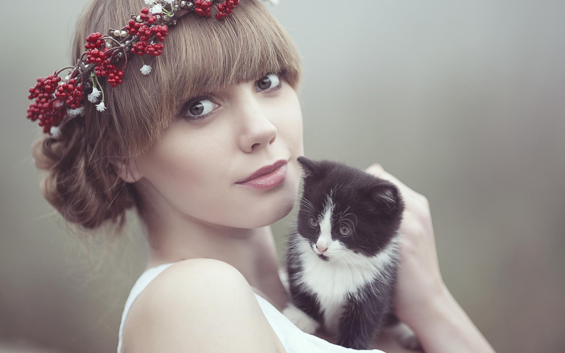 Woman with flower crown holding a kitten HD Wallpaper