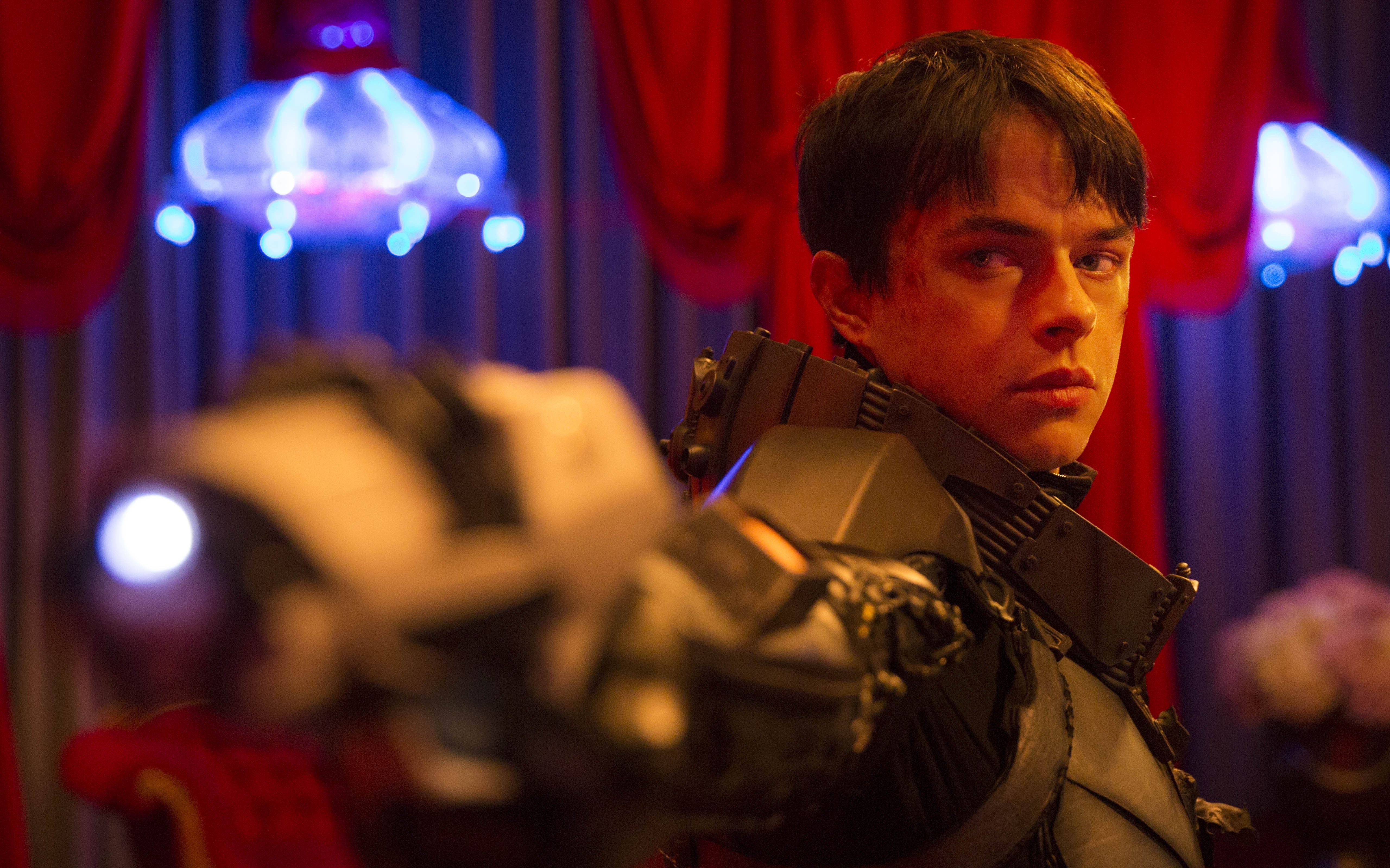 Dane DeHaan holding a weapon HD Wallpaper