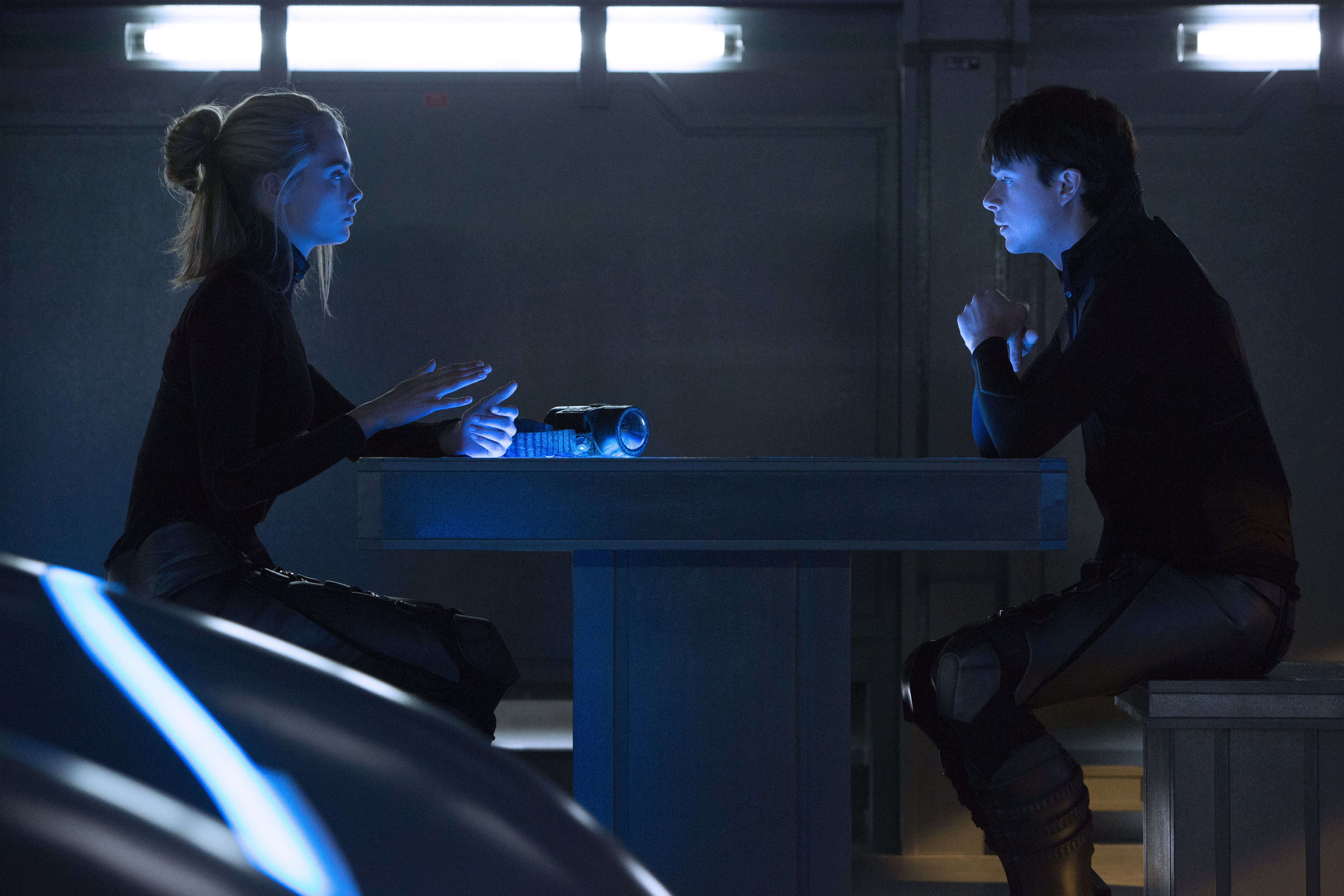 Dane DeHaan in a futuristic setting HD Wallpaper