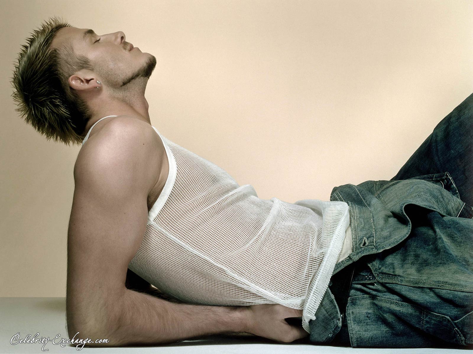 David Beckham in white mesh tank top and jeans HD Wallpaper