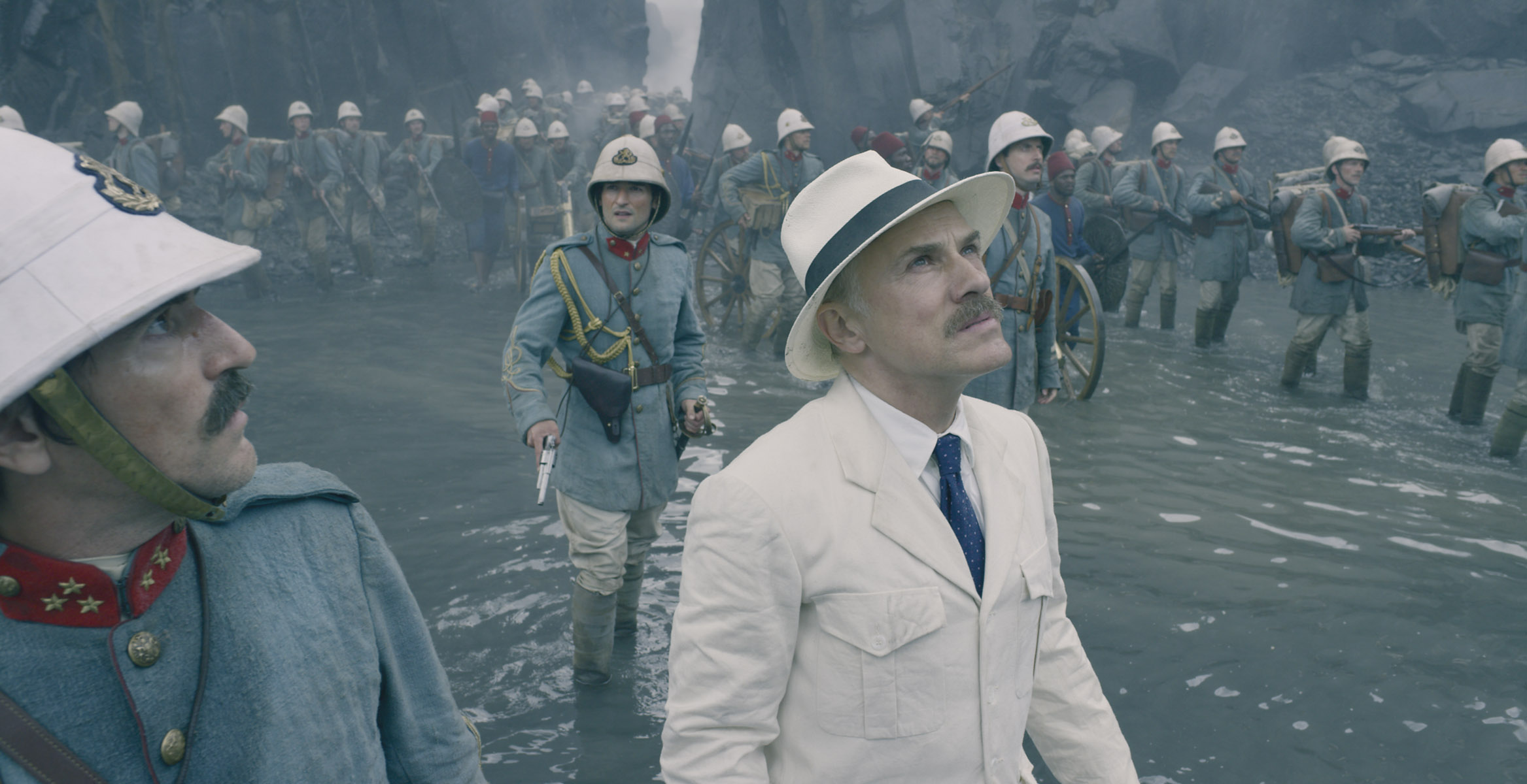 Christoph Waltz leading soldiers in water HD Wallpaper