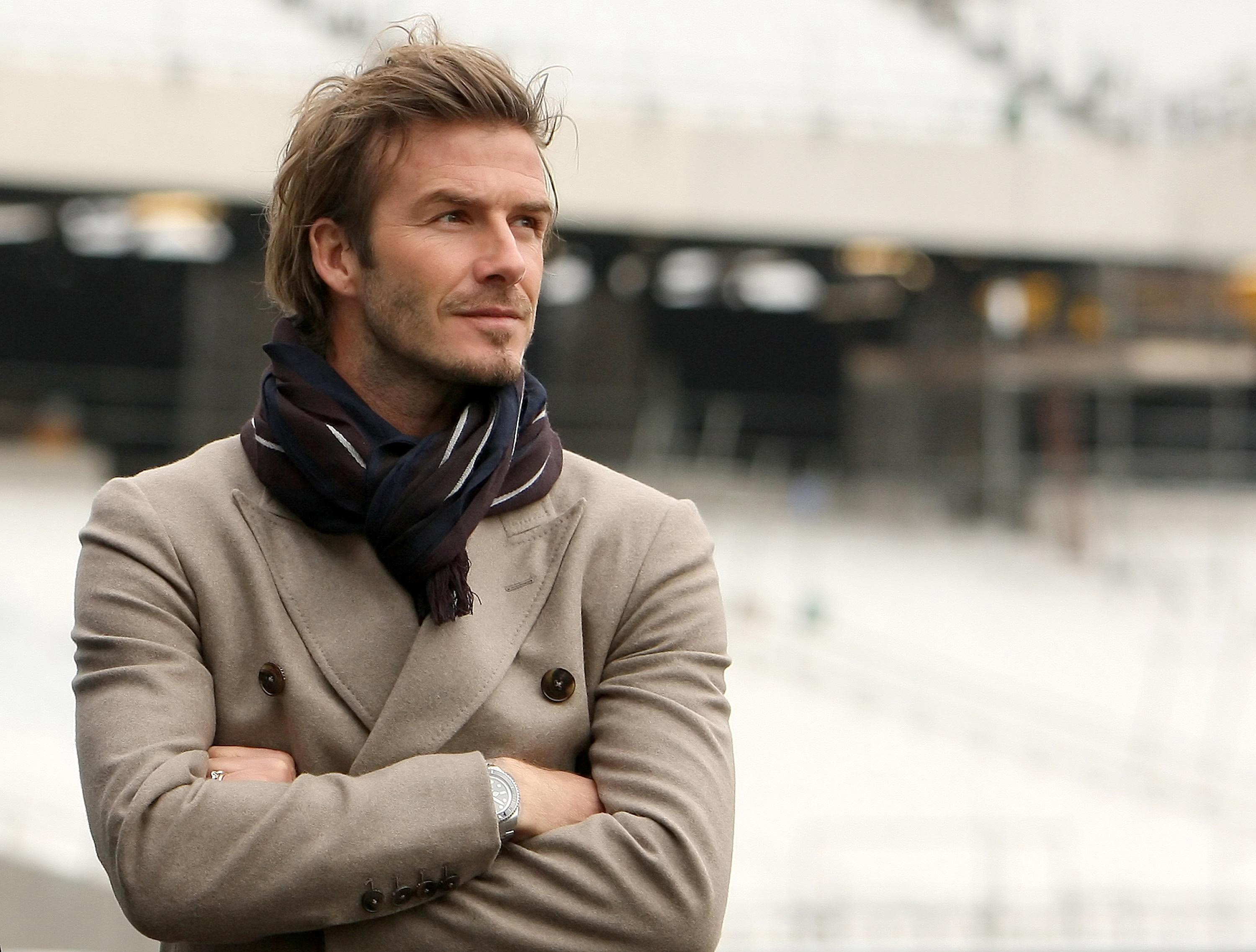 David Beckham wearing a scarf and coat HD Wallpaper