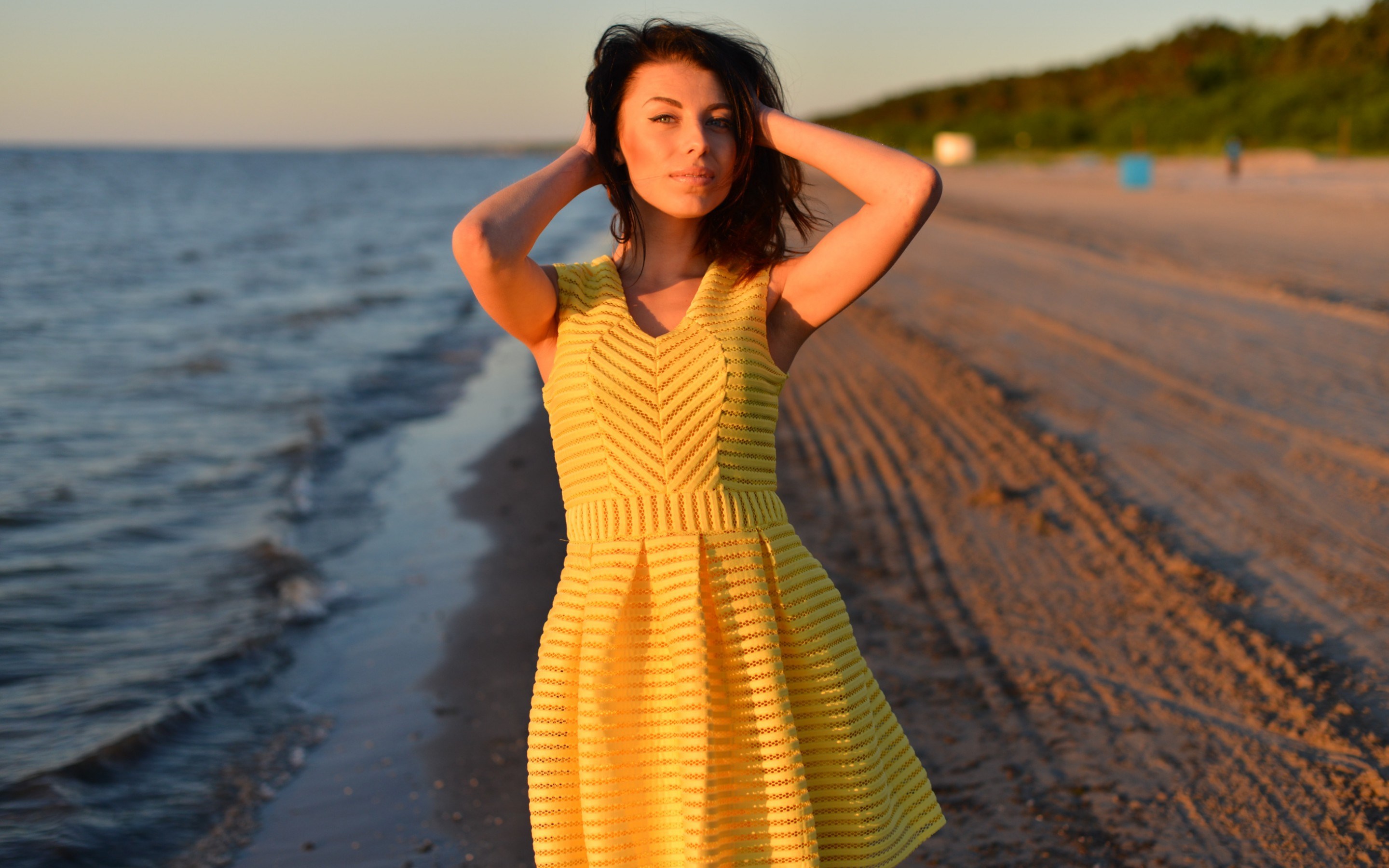 Woman in yellow dress on beach at sunset HD Wallpaper
