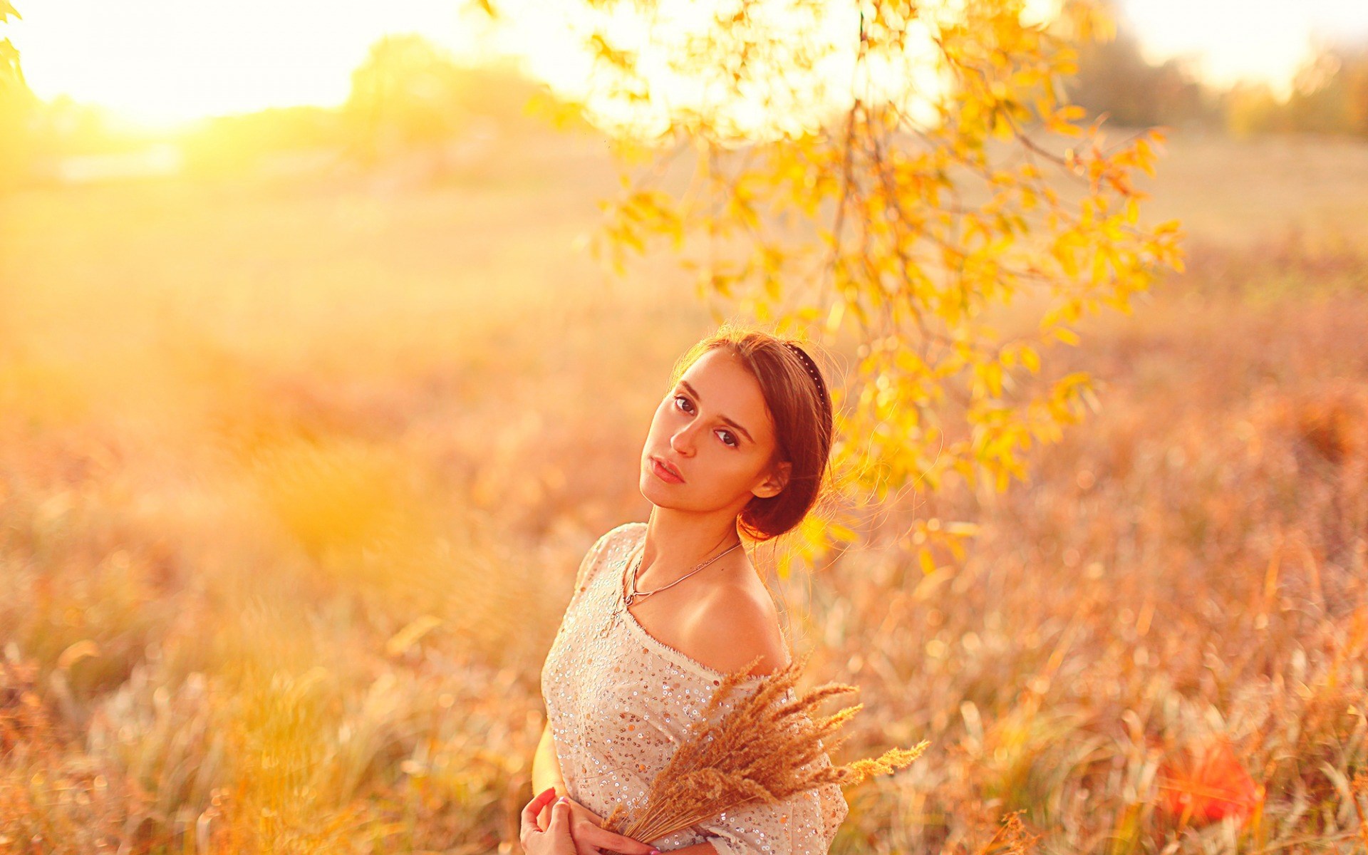 Woman in a field with wheat during sunset HD Wallpaper
