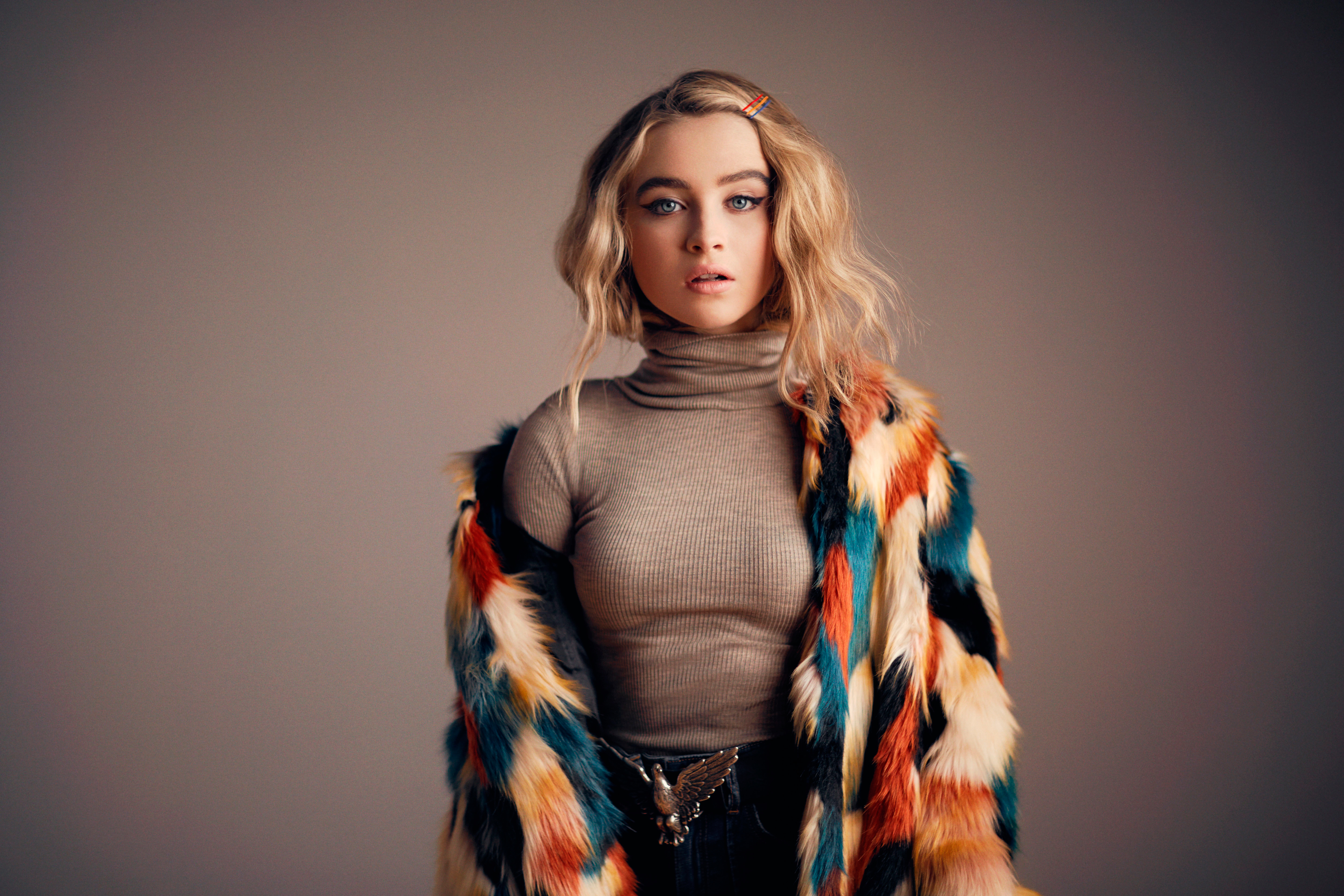 Sabrina Carpenter in a colorful fur coat HD Wallpaper