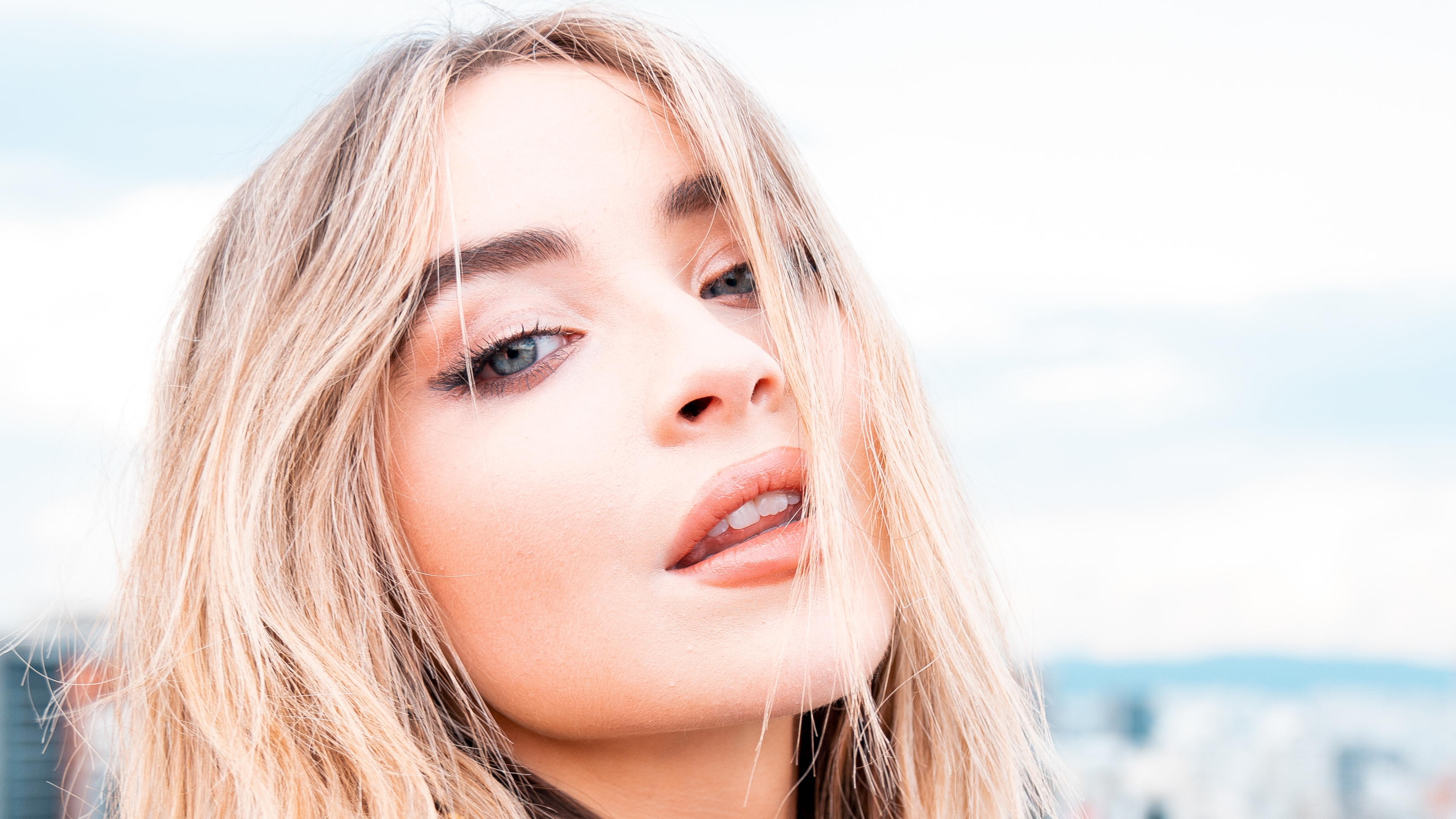 Sabrina Carpenter close-up portrait HD Wallpaper