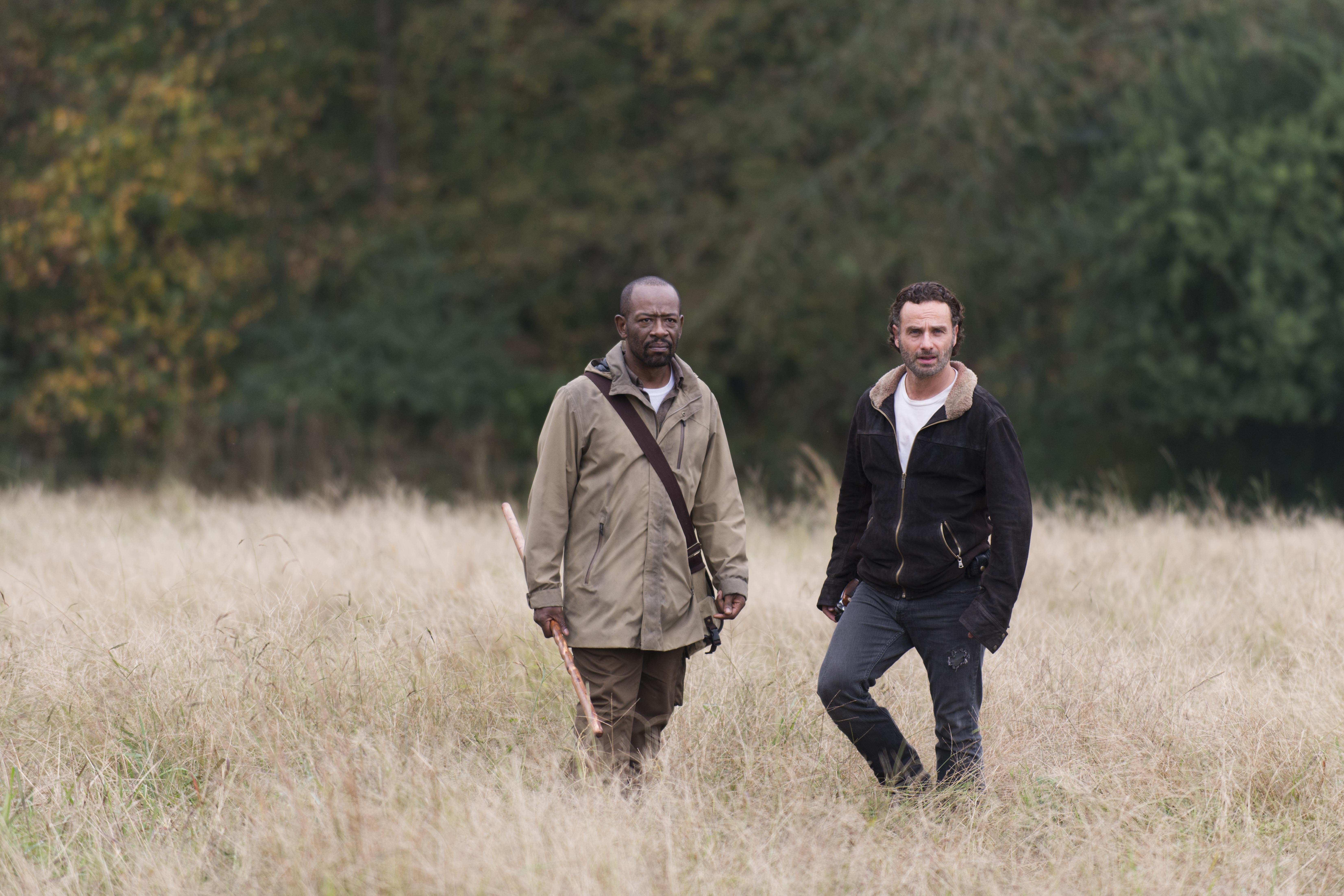 Lennie James and Rick Grimes walking in a field HD Wallpaper