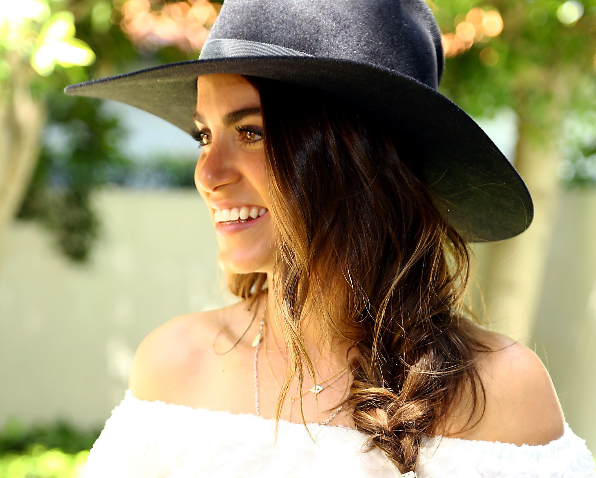 Nikki Reed wearing a black hat and white off-the-shoulder top HD Wallpaper