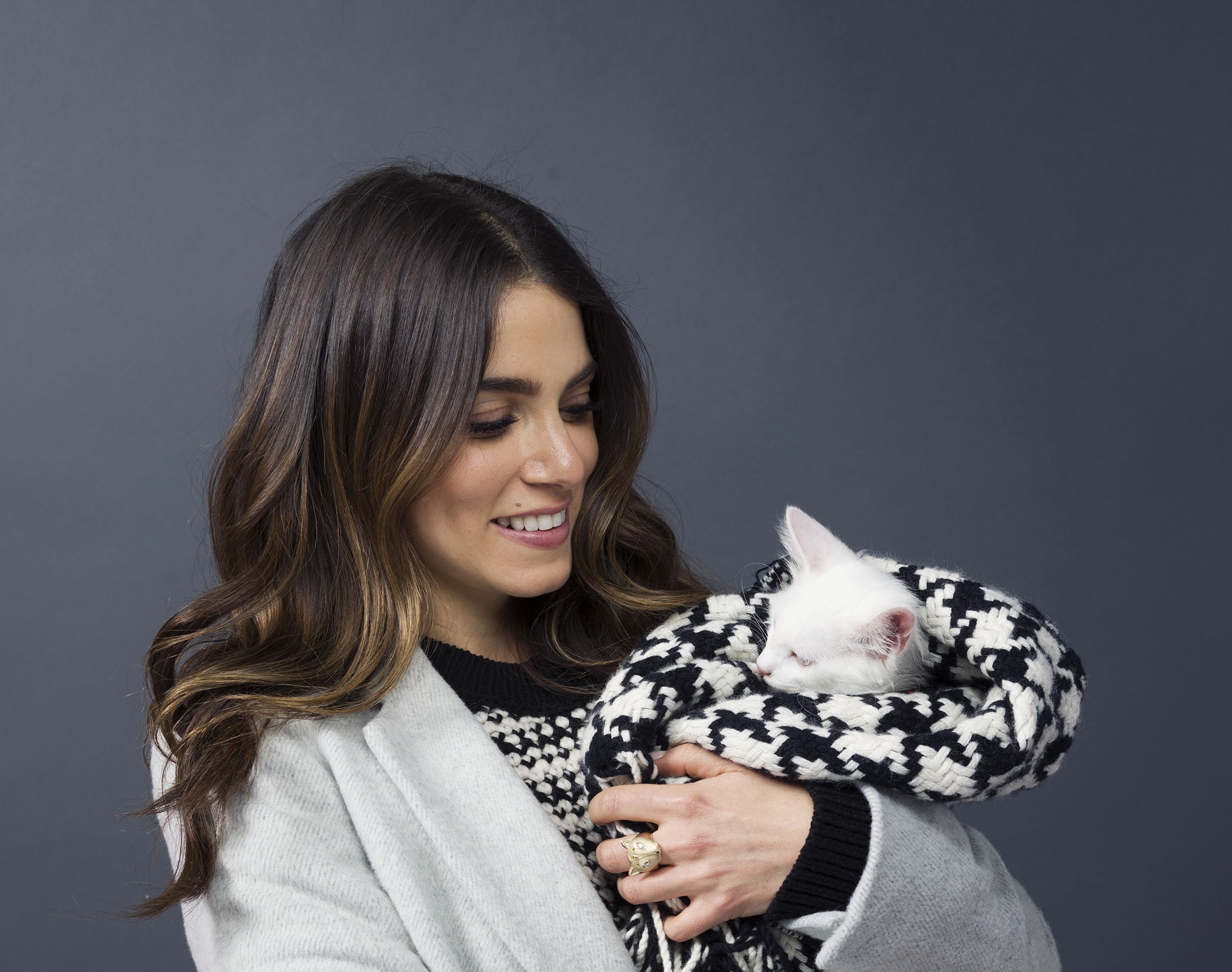 Nikki Reed holding a white rabbit HD Wallpaper