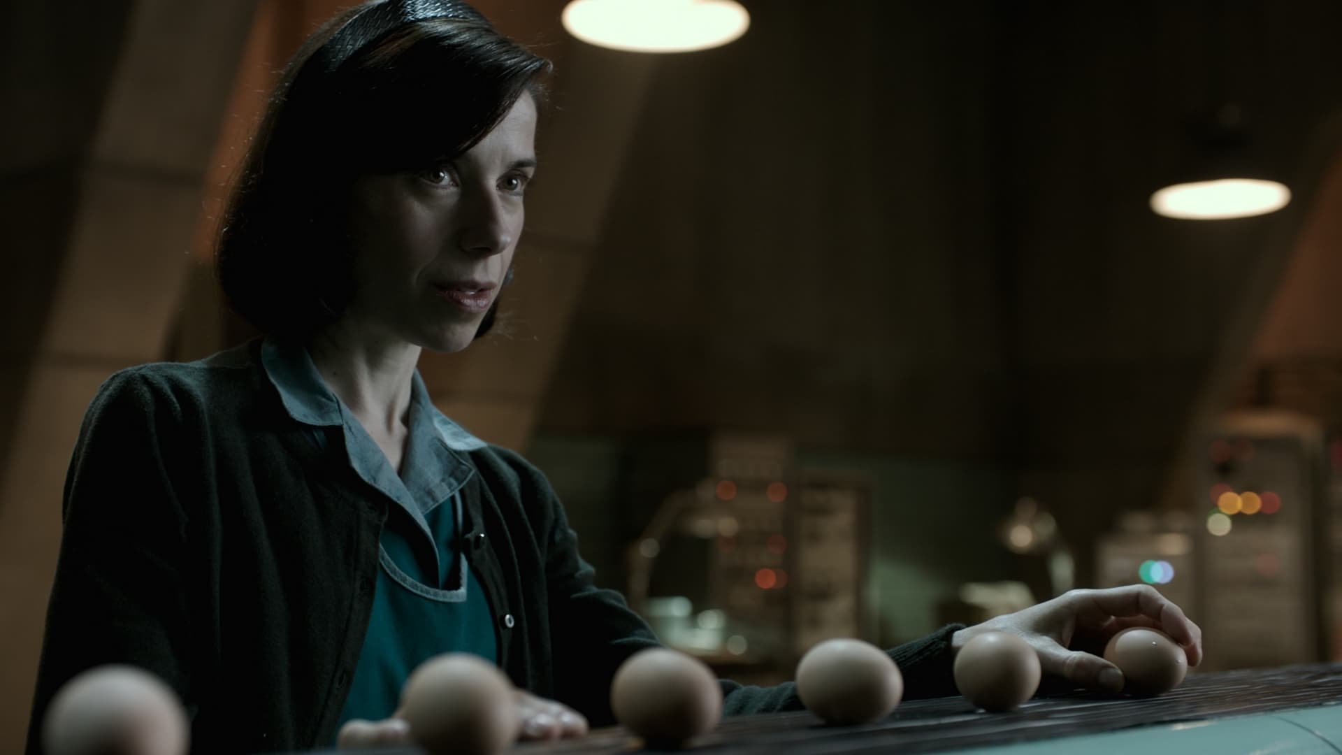 Sally Hawkins in a dark room with eggs HD Wallpaper