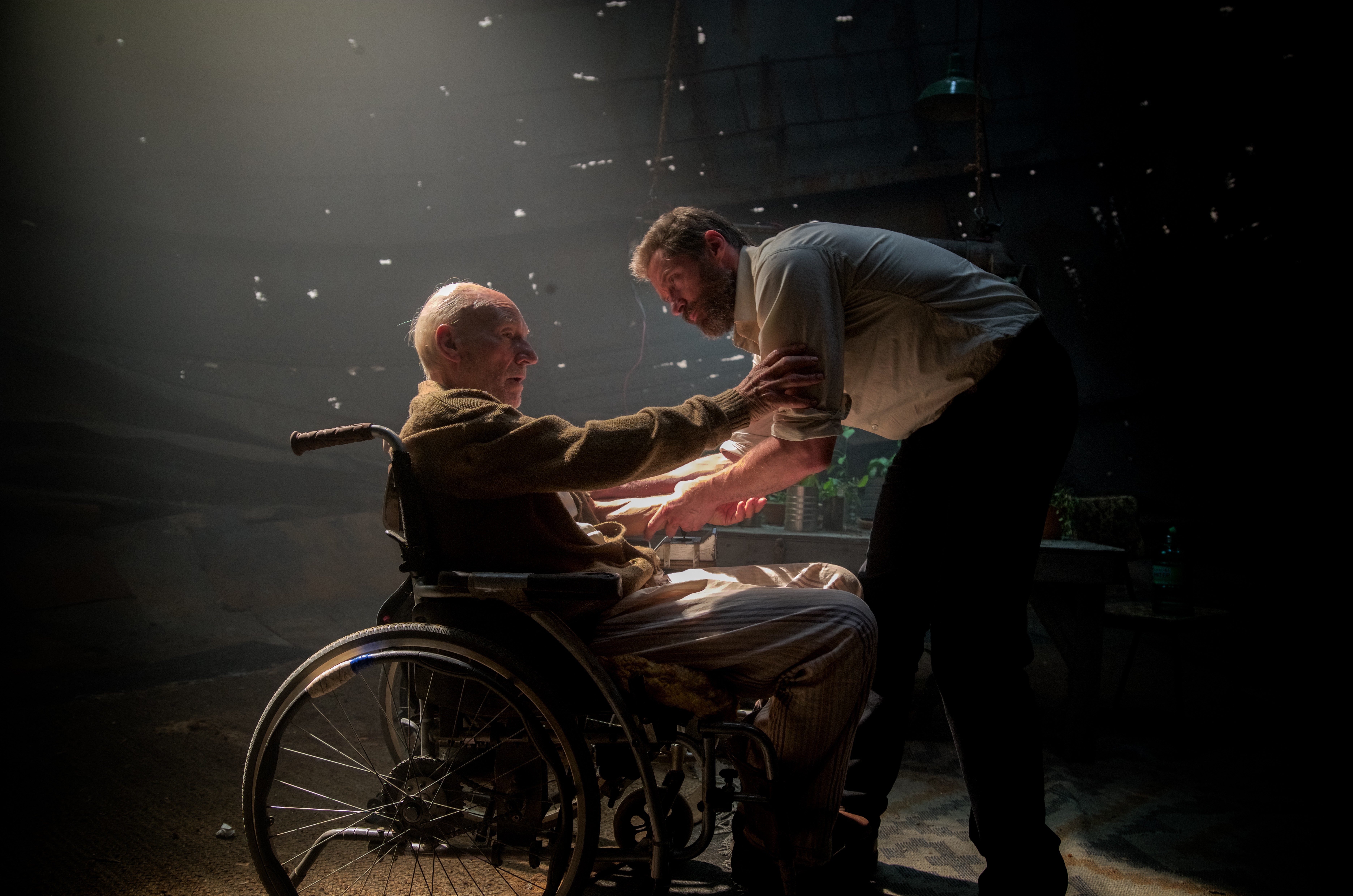 Patrick Stewart in a wheelchair with another man HD Wallpaper
