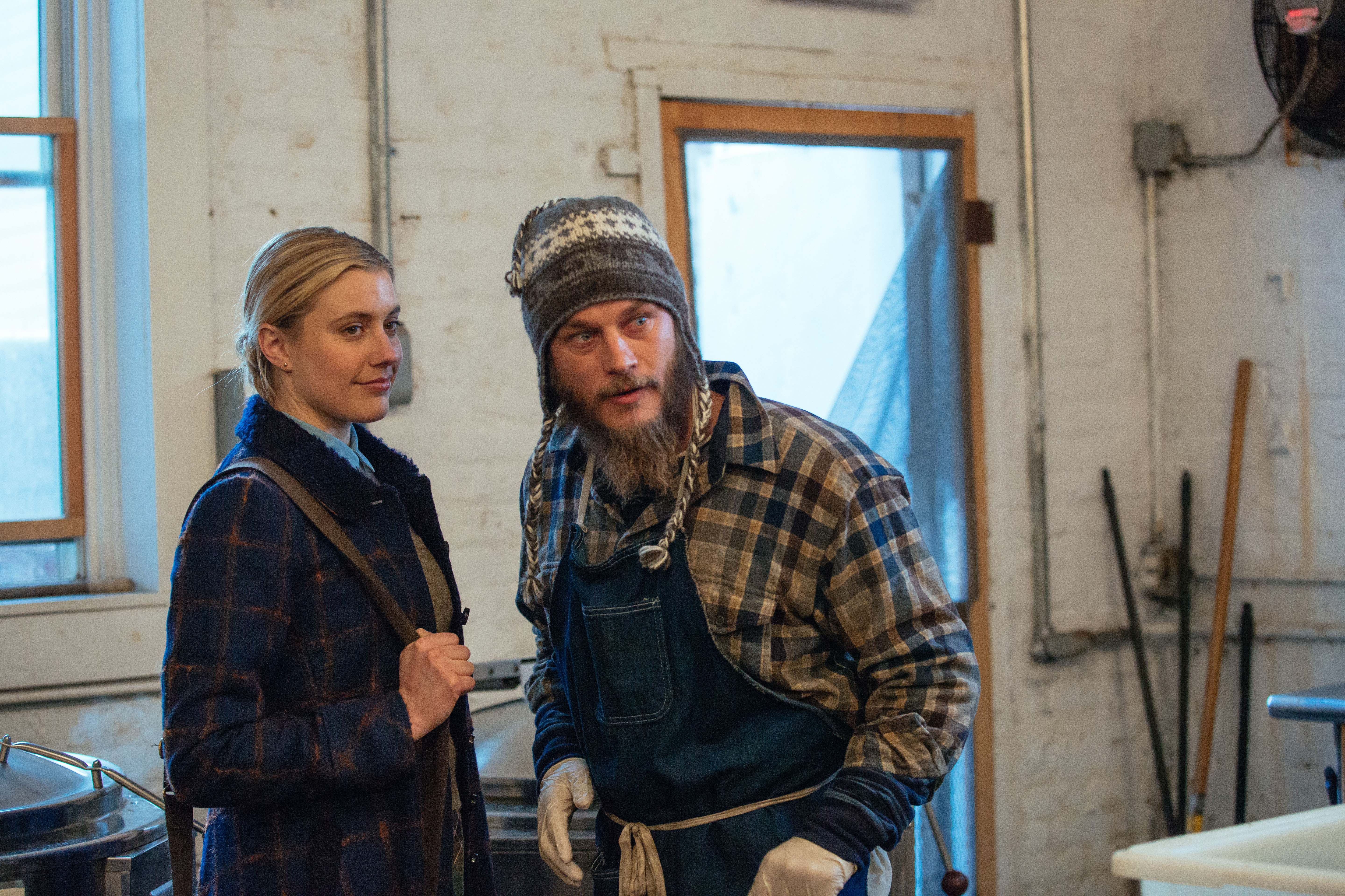 Travis Fimmel in a plaid shirt and beanie HD Wallpaper