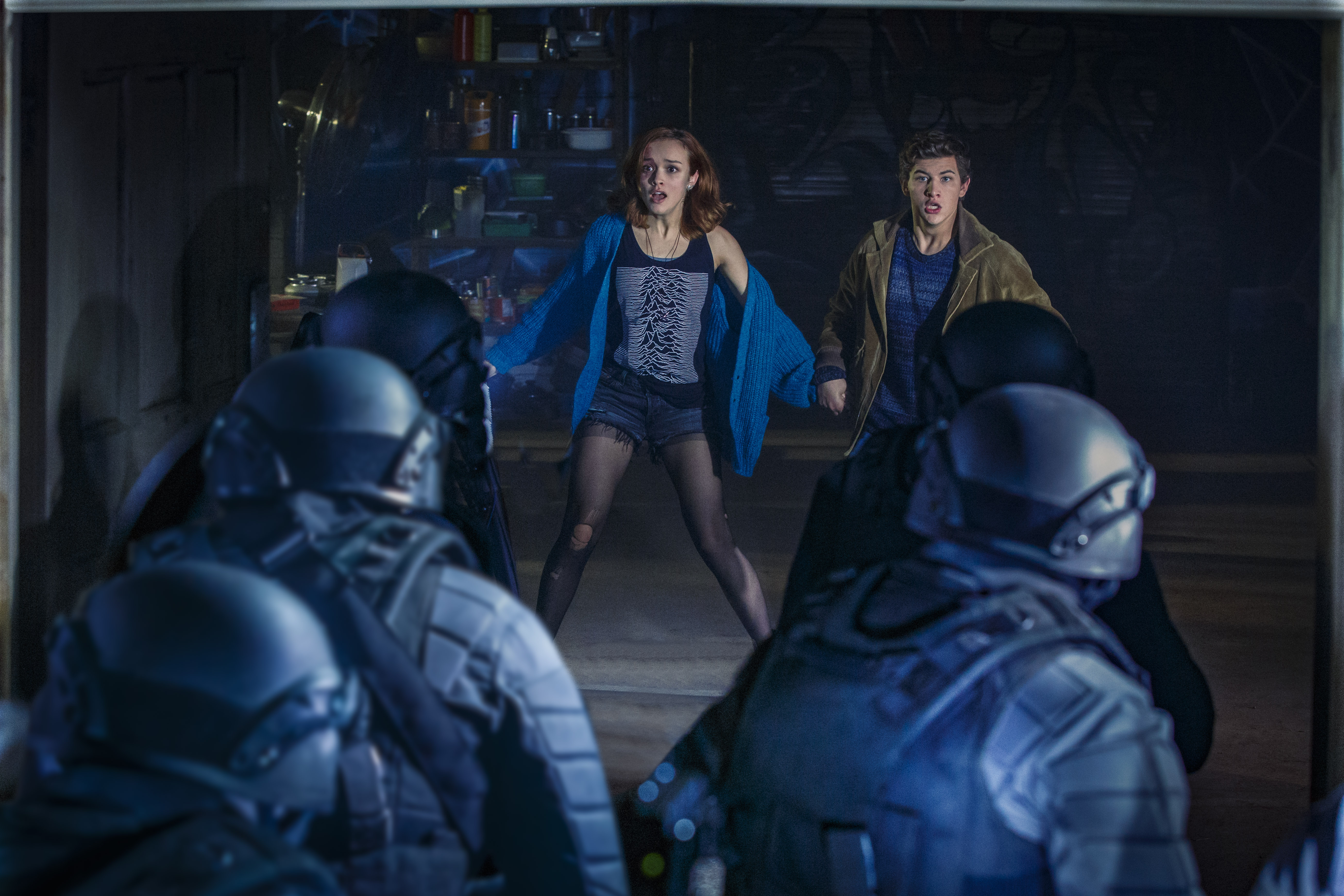 Two teenagers facing riot police HD Wallpaper