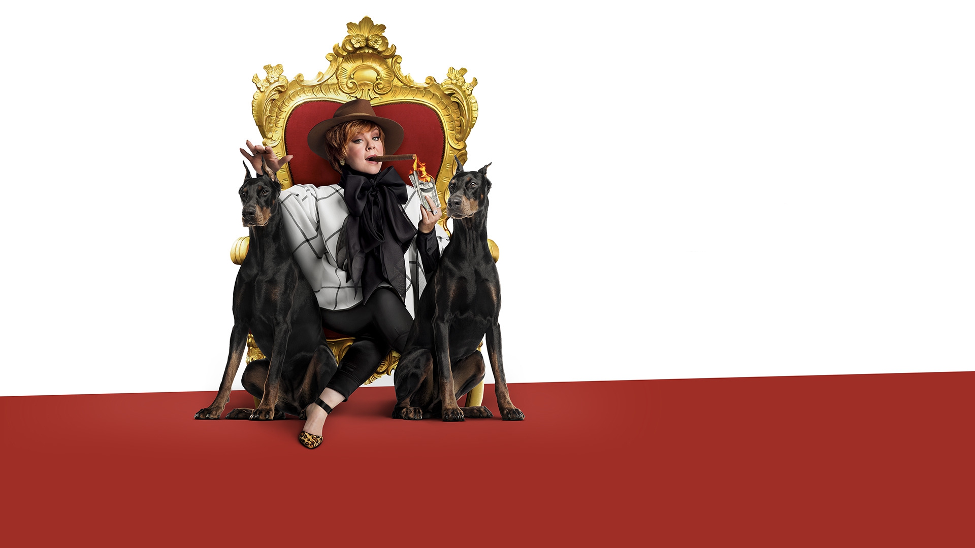 Melissa McCarthy on a throne with Dobermans HD Wallpaper