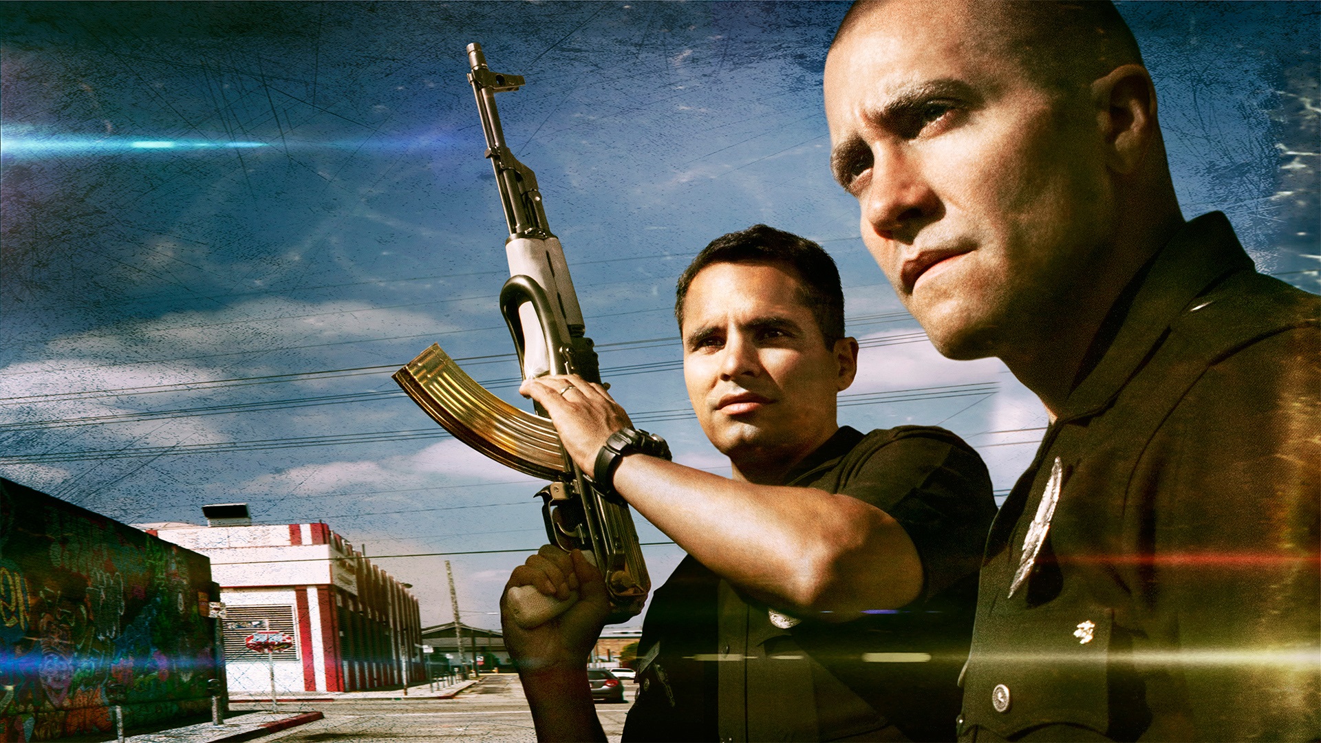Michael Peña and Jake Gyllenhaal with AK-47 HD Wallpaper