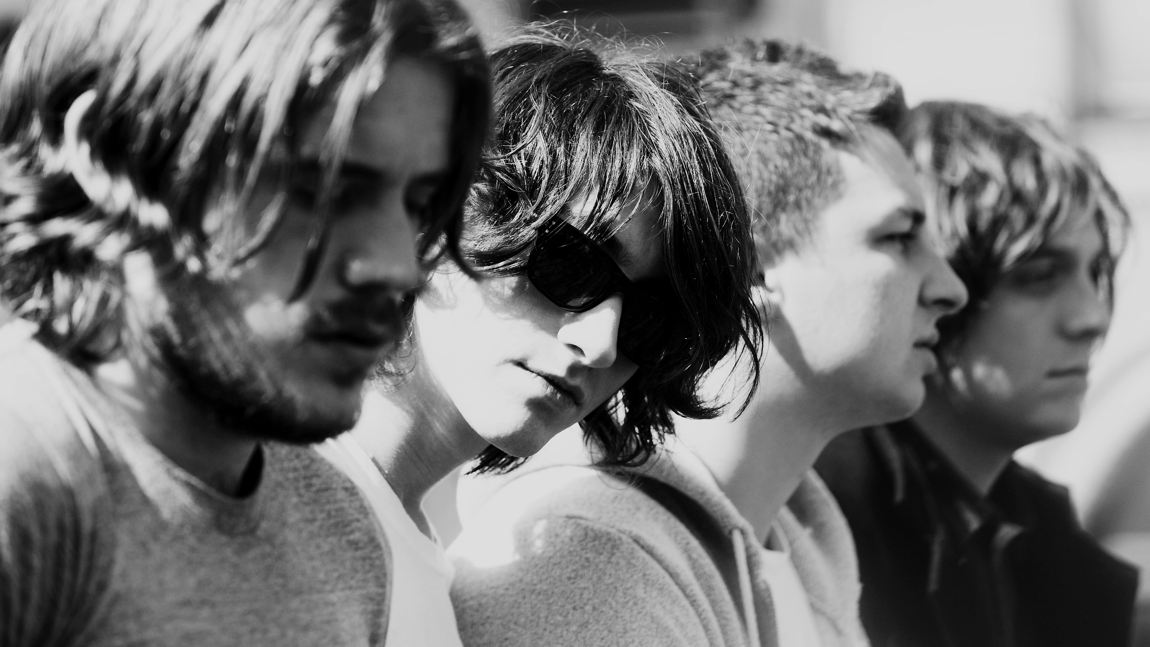 Arctic Monkeys band members in black and white HD Wallpaper