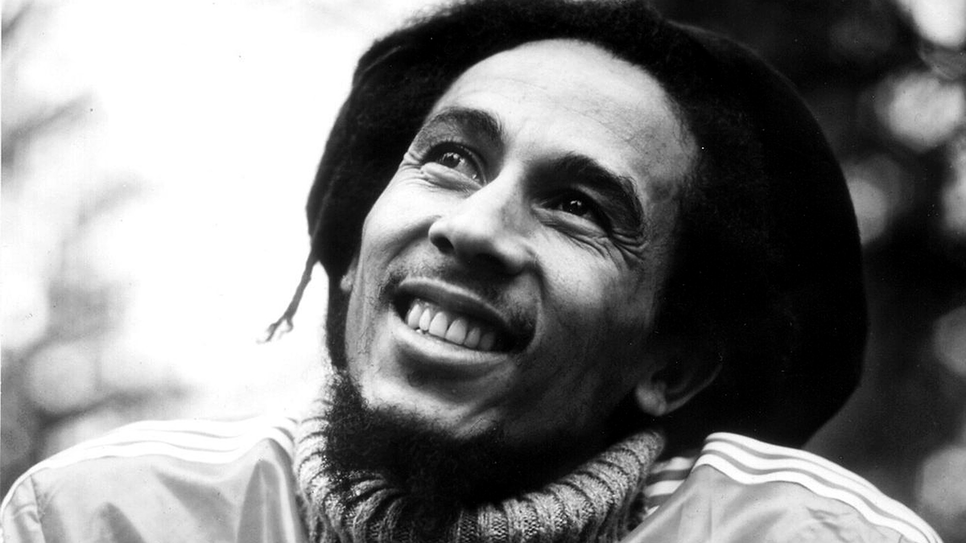 Portrait of Smiling Bob Marley in Cozy Attire HD Wallpaper