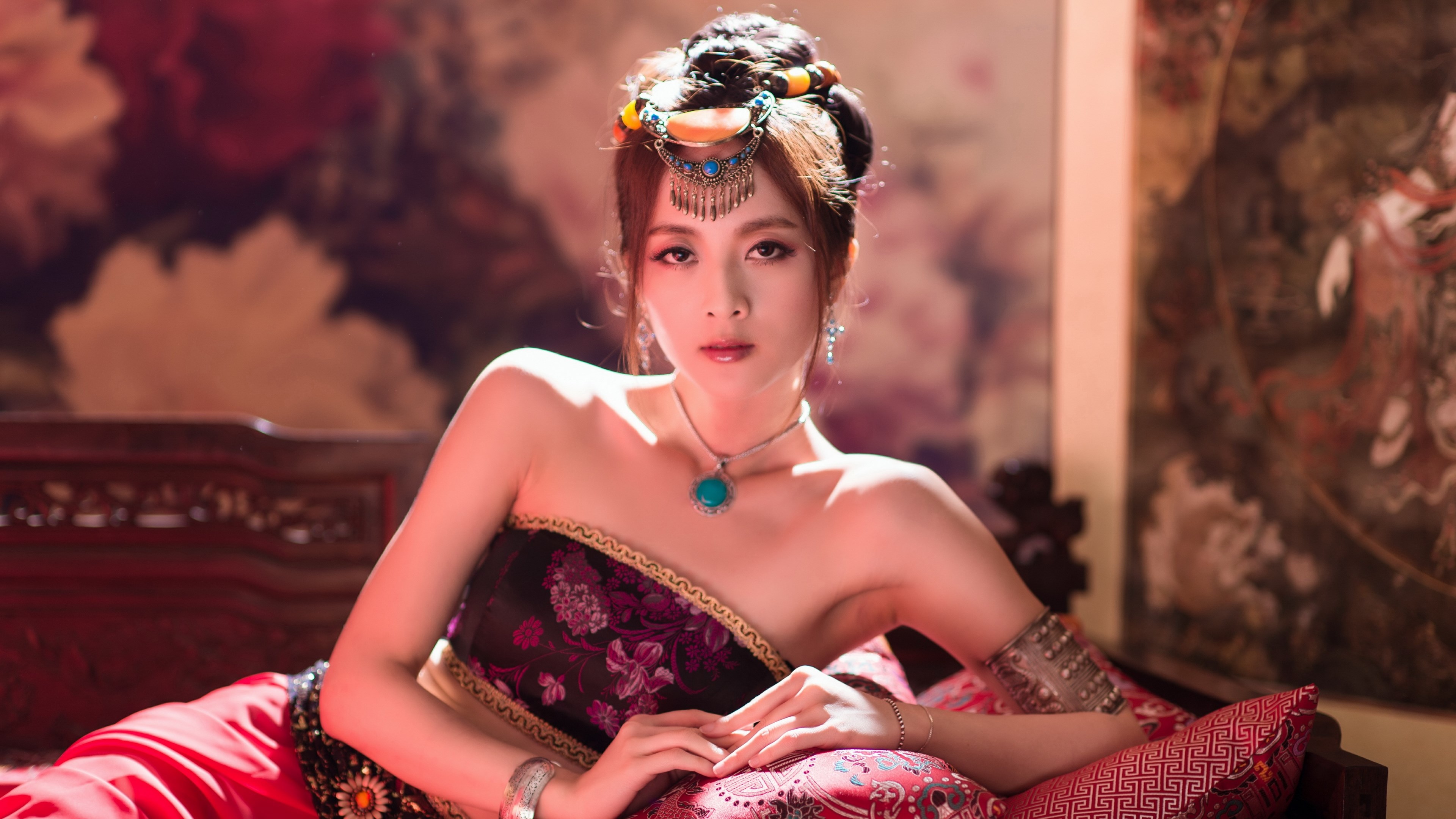 Woman in traditional costume with ornate jewelry HD Wallpaper