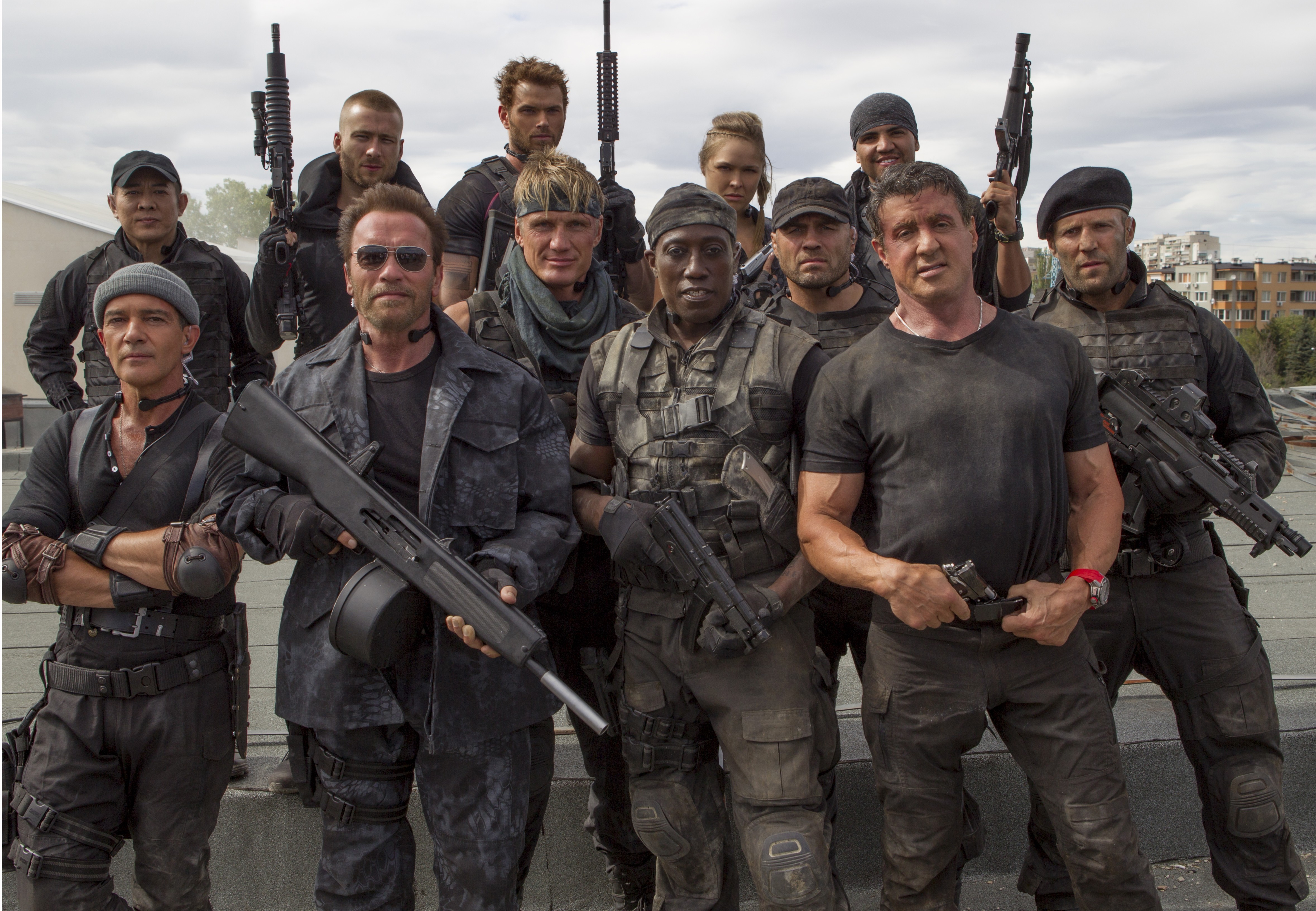 The Expendables 3 cast posing with weapons HD Wallpaper