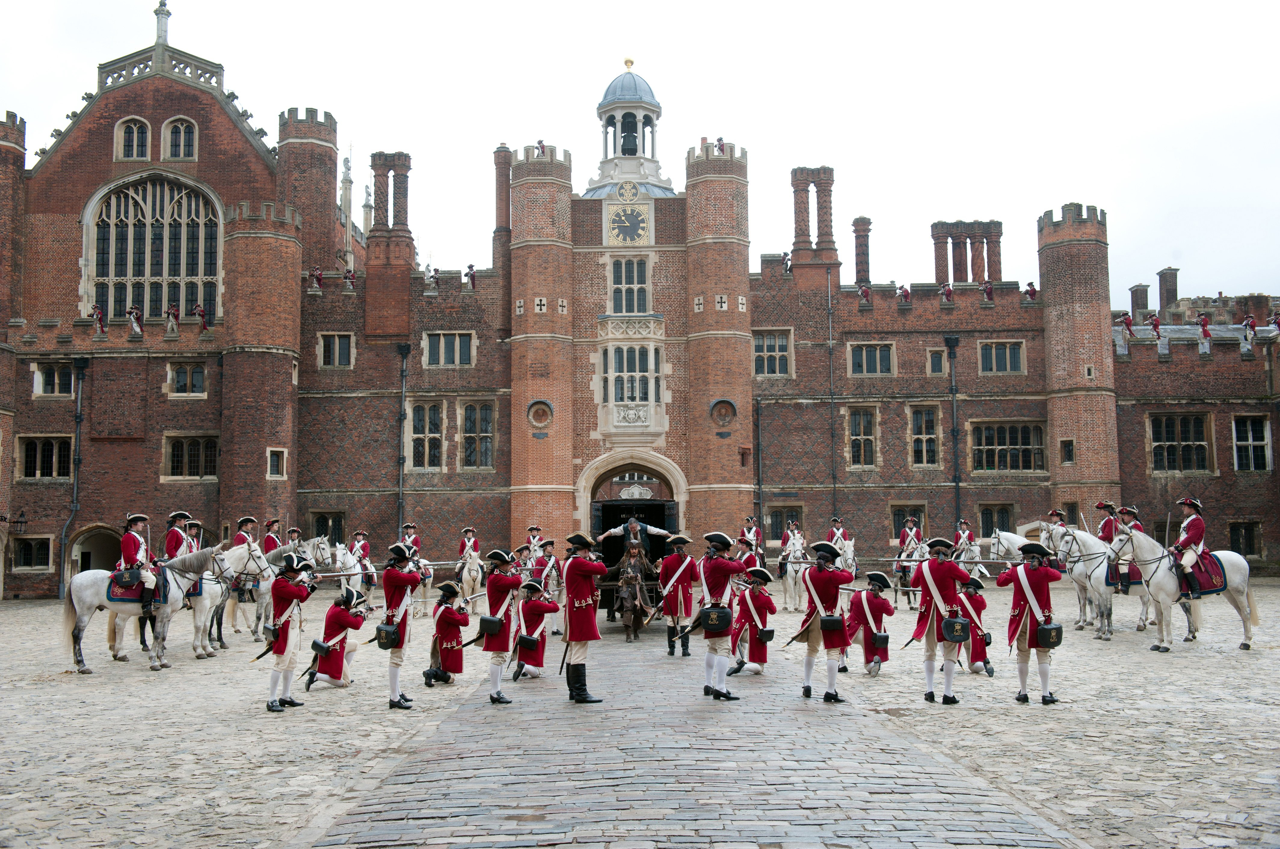 Kevin McNally in historical costumes outside a palace HD Wallpaper