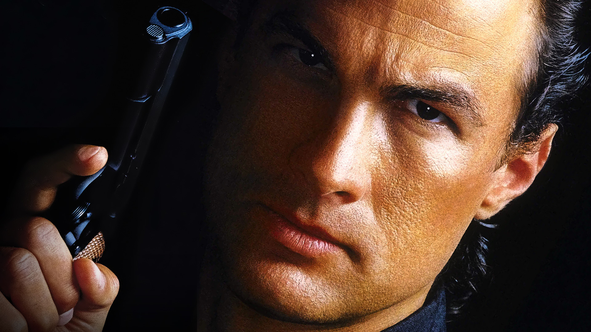 Steven Seagal holding a gun HD Wallpaper