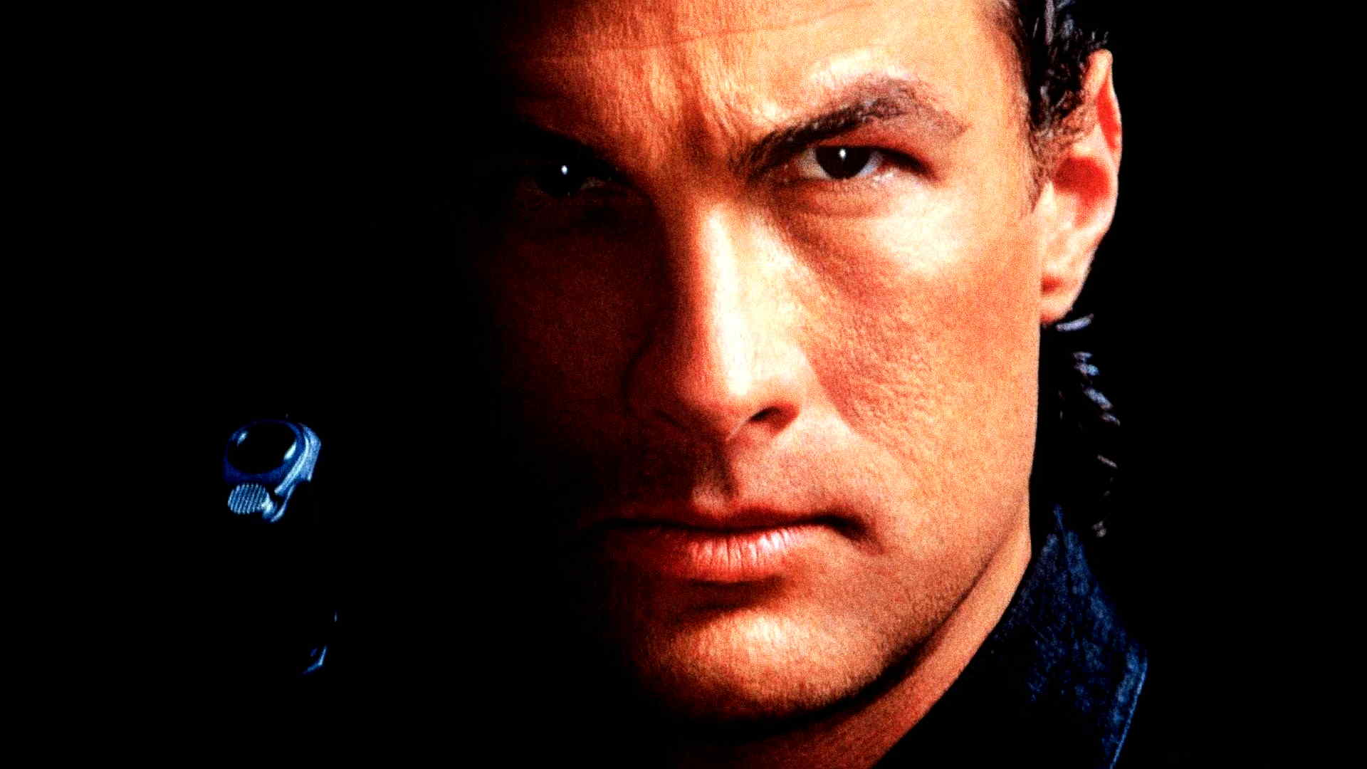 Steven Seagal with a gun HD Wallpaper