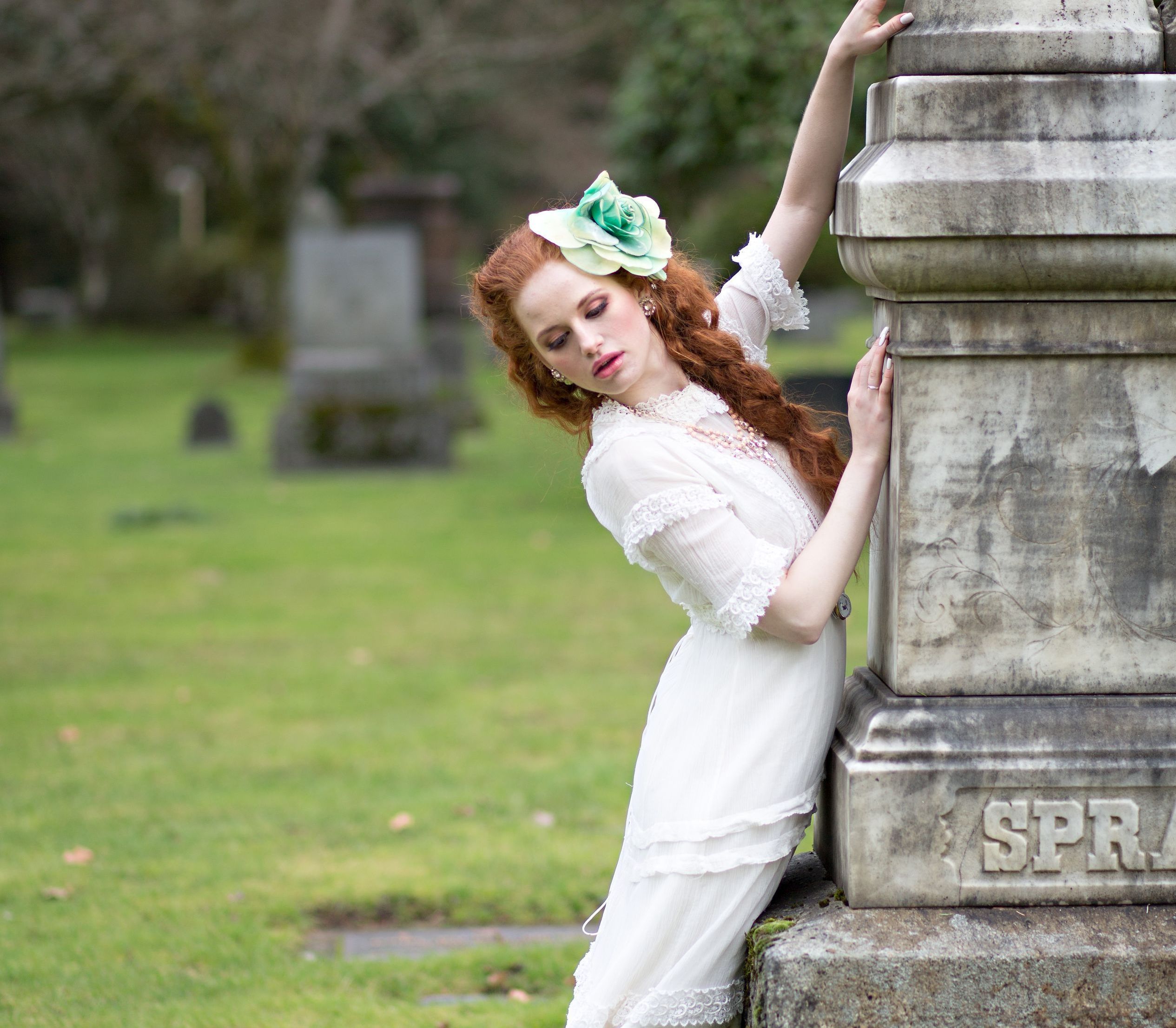 Madelaine Petsch in a white dress in a cemetery HD Wallpaper