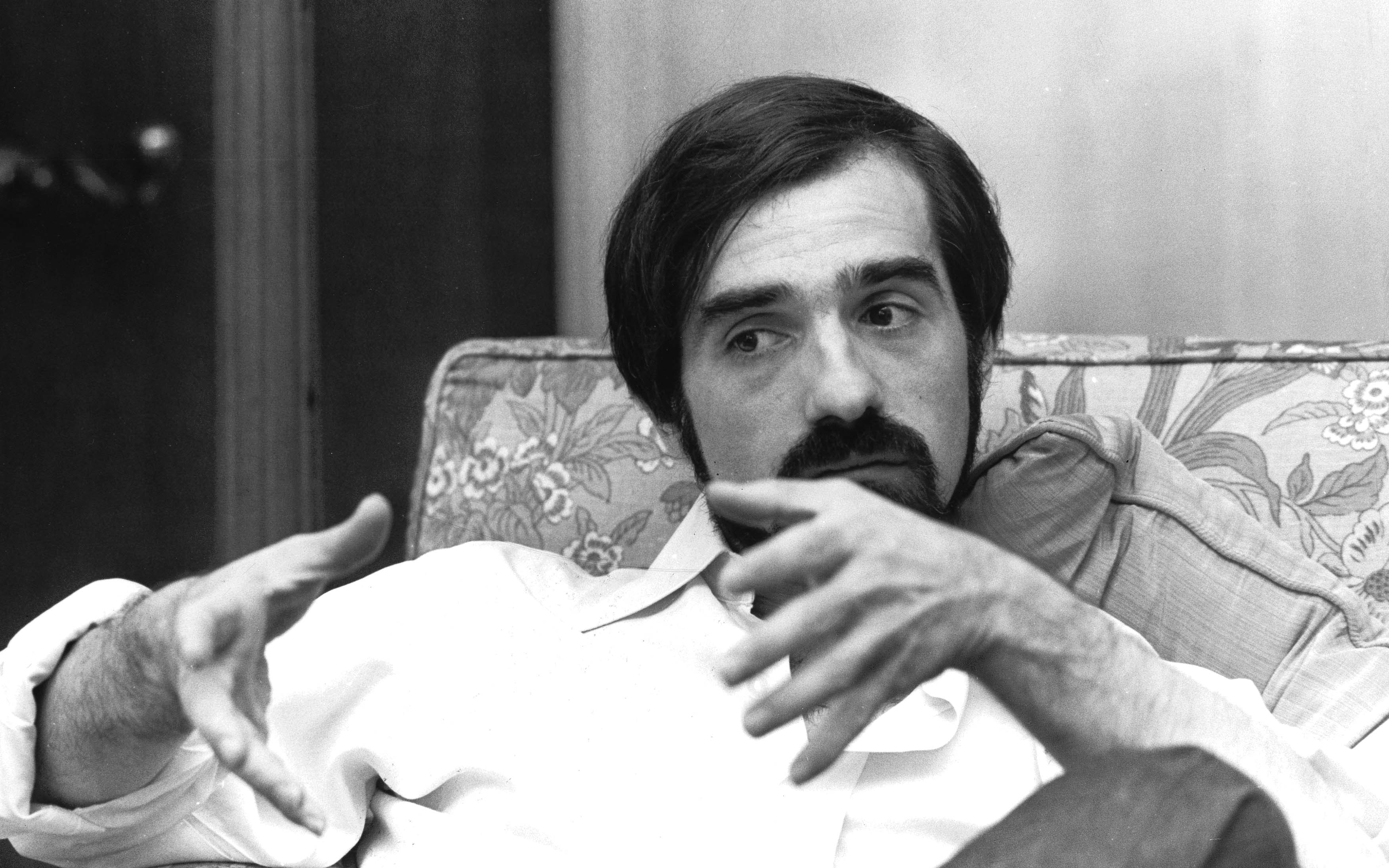 Martin Scorsese sitting on a couch HD Wallpaper