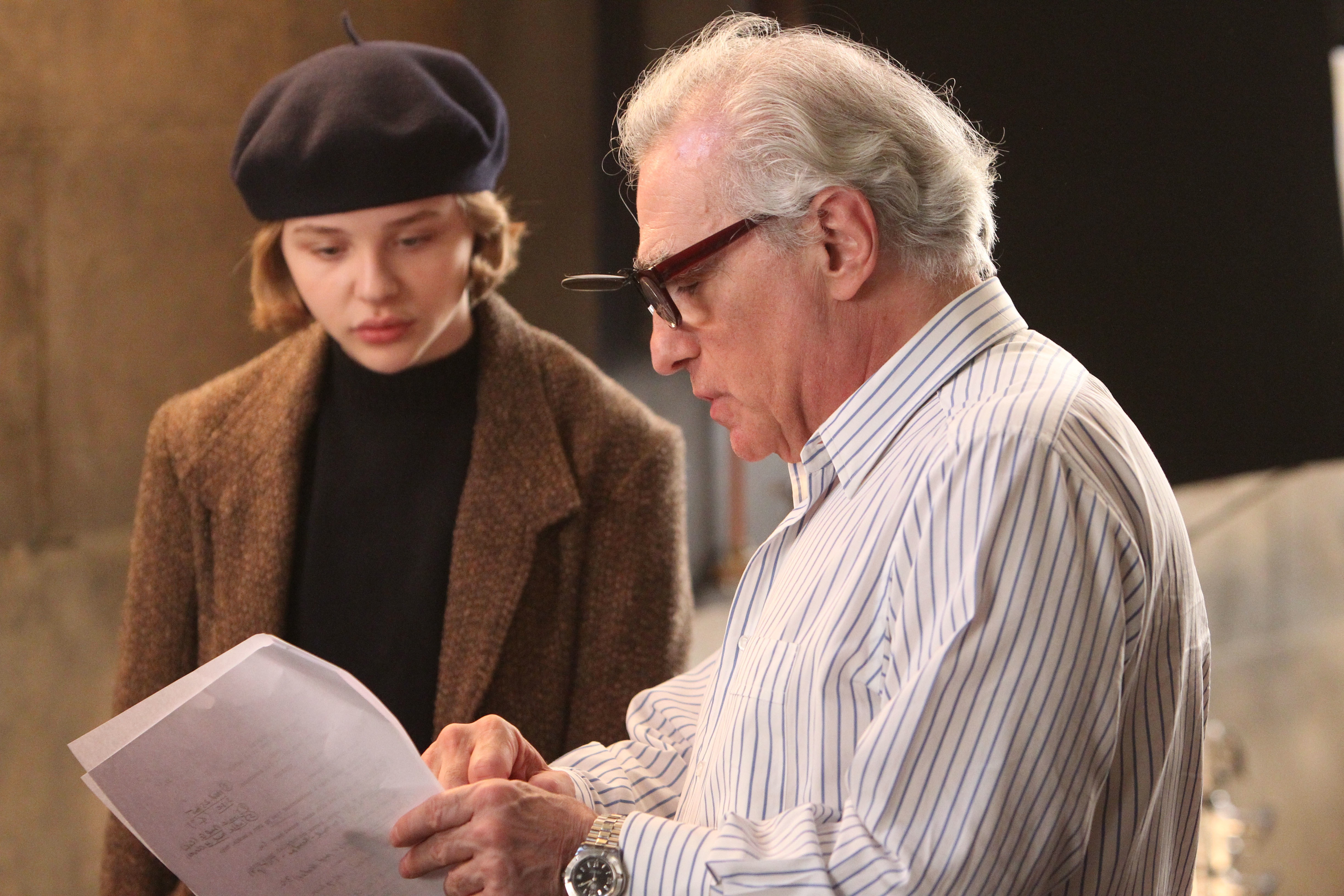 Martin Scorsese and Chloë Grace Moretz on set HD Wallpaper