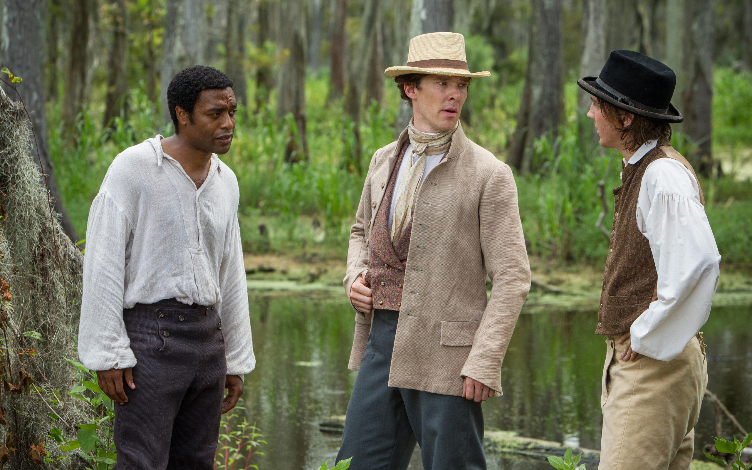 Chiwetel Ejiofor, Benedict Cumberbatch, and Paul Dano in a swamp HD Wallpaper