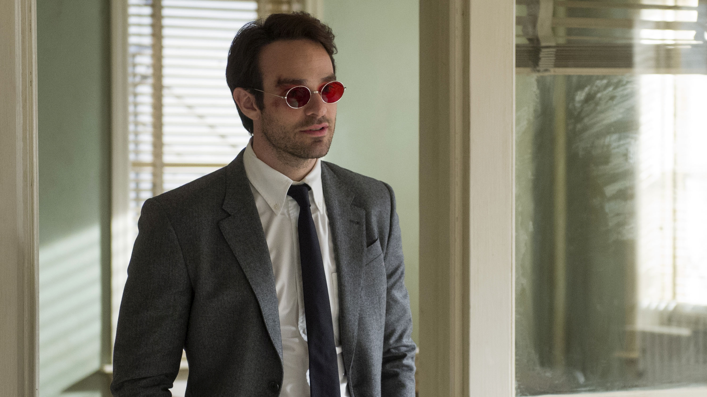 Charlie Cox wearing sunglasses and a suit HD Wallpaper