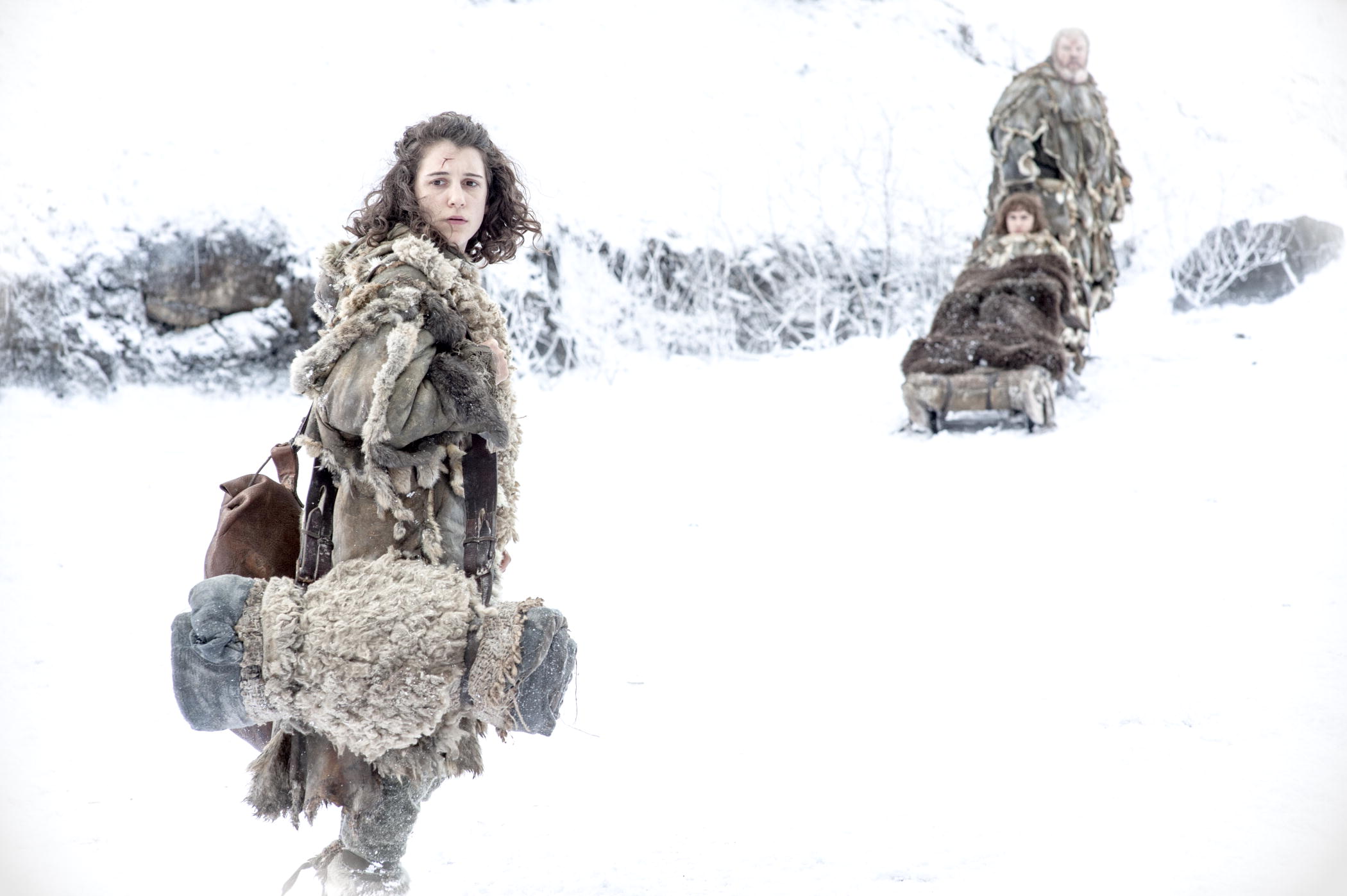 Girl in fur clothing in snowy landscape HD Wallpaper