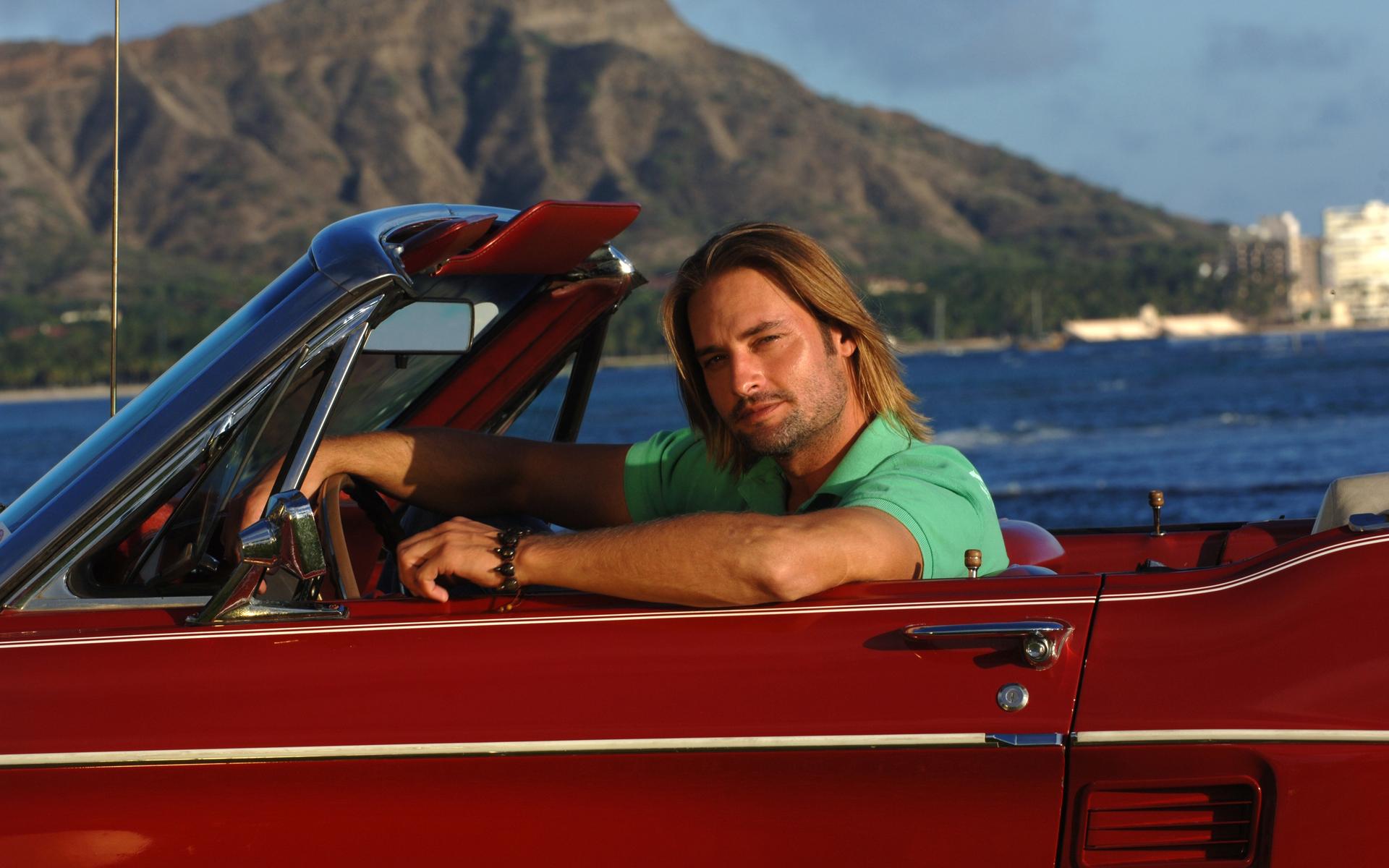 Josh Holloway in a red convertible HD Wallpaper